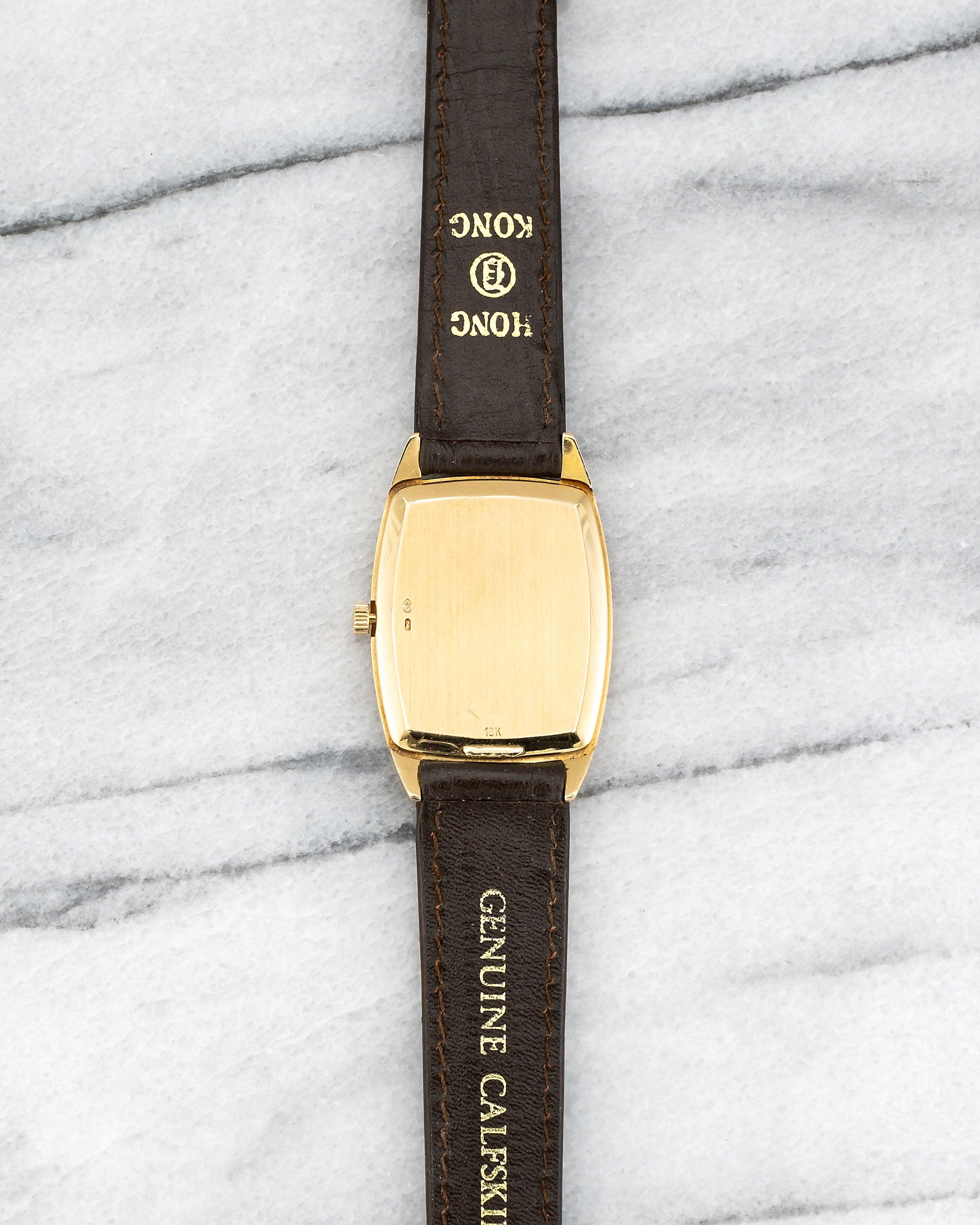 Women's or Men's Patek Philippe Tank Black Roman Dial Watch in 18K Yellow Gold, 1970s For Sale