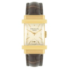 Patek Philippe Zylinderuhr Vintage mit einem gelbgold silbernen Zifferblatt 1450