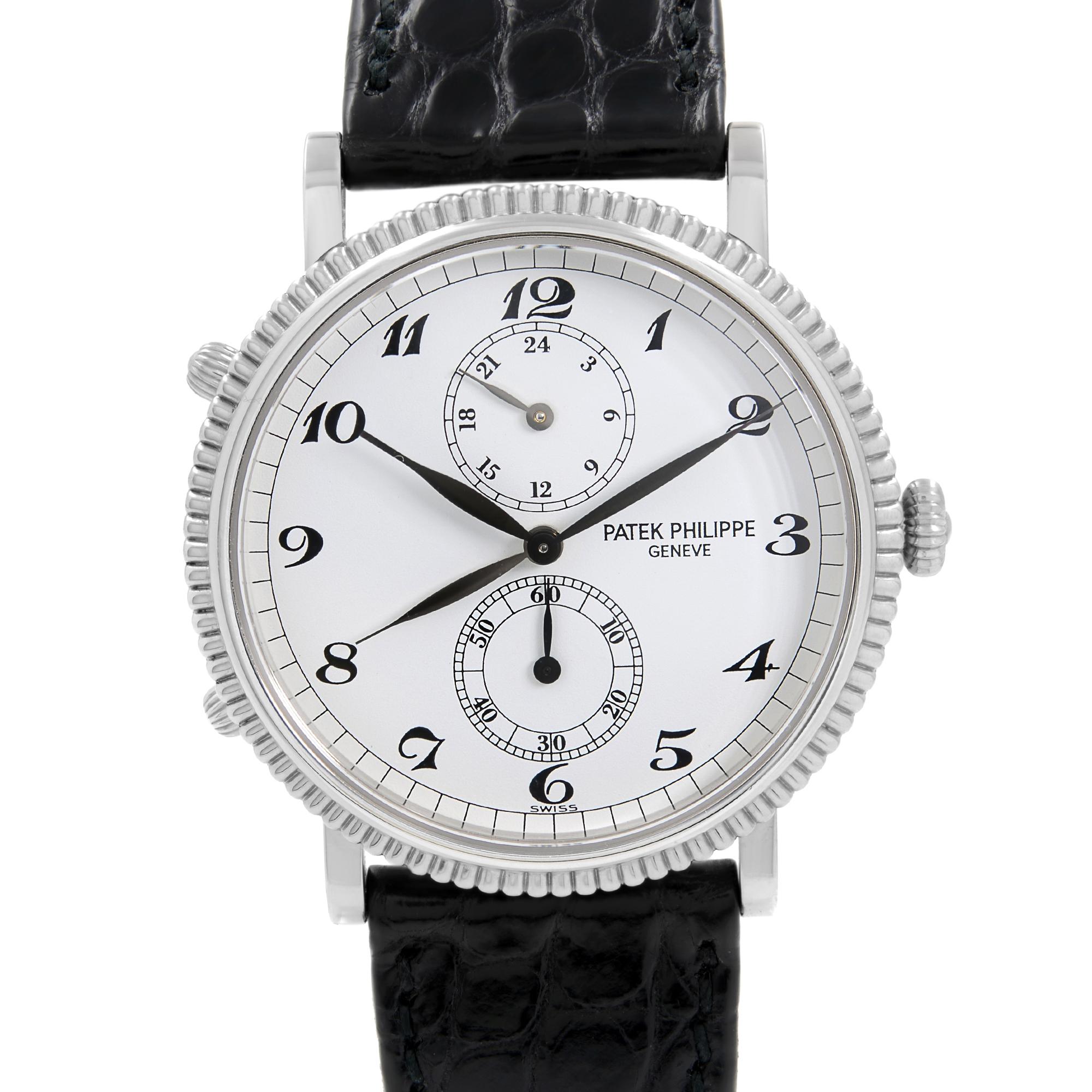 Small Stain on the Inner Leather Strap. Pre-owned Patek Philippe Travel Time 18k White Gold Black Crocodile Strap Men's Watch 5034G This Beautiful Timepiece is Powered by a Mechanical (Manual-Wind ) Movement Round White Gold Case & Black Crocodile