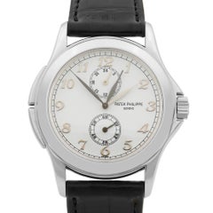 Patek Philippe Travel Time 18 Karat Gold White Dial Hand-Wind Men's Watch 5134G