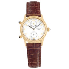 Patek Philippe Travel Time 18k yellow gold Manual Wristwatch Ref 4864j