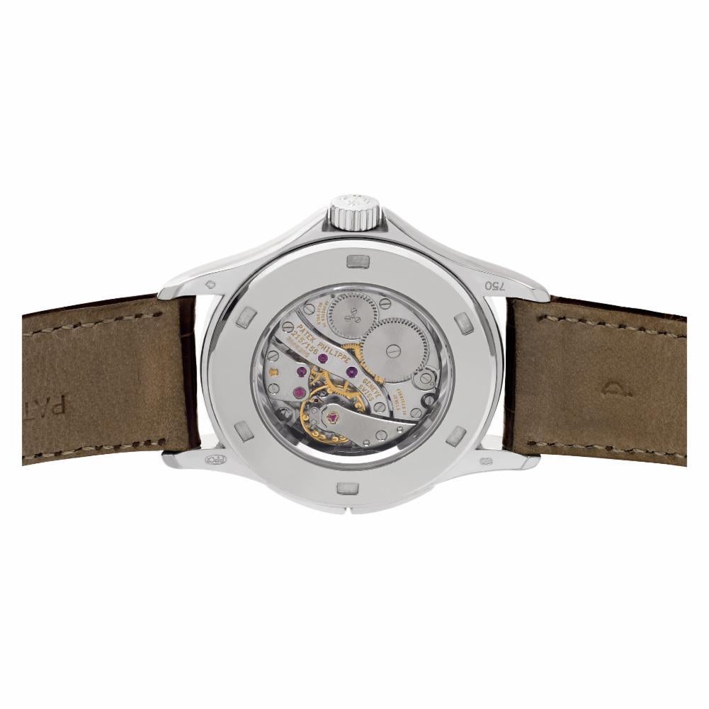 Patek Philippe Travel Time 5134, Silver Dial, Certified and Warranty In Excellent Condition In Miami, FL