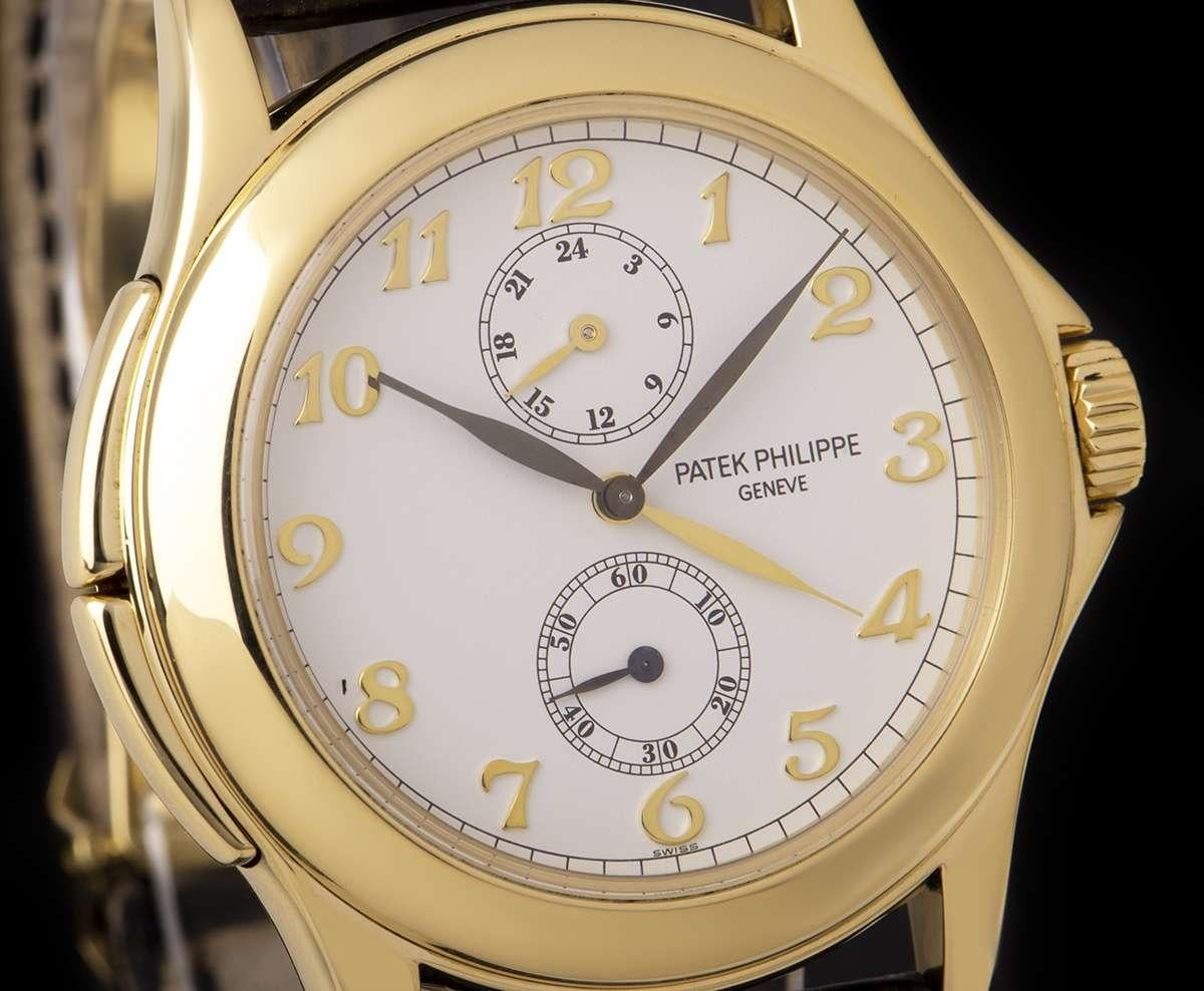 Patek Philippe Travel Time Gold White Dial 5134J-001 Manual Wind Watch In Good Condition In Mayfair, London, London