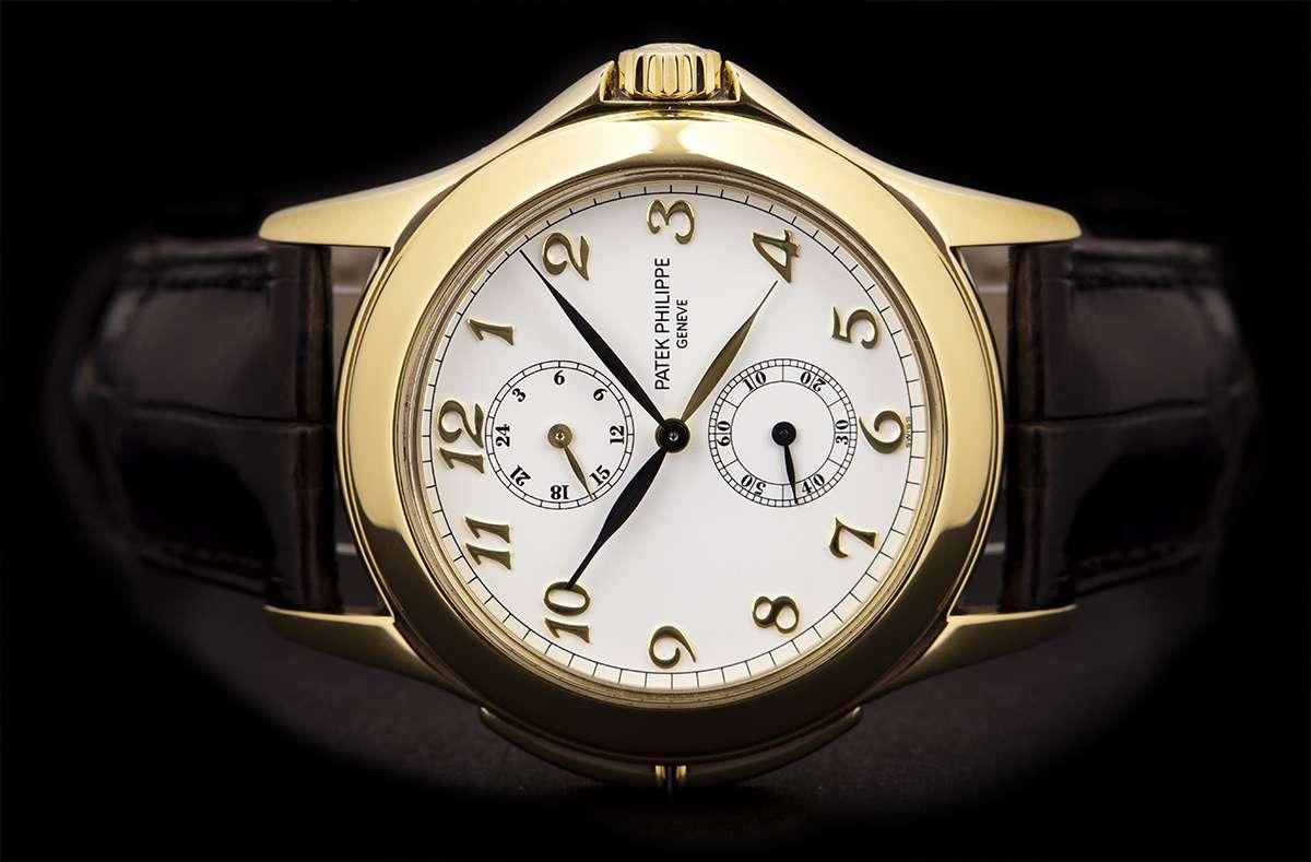 Men's Patek Philippe Travel Time Gold White Dial 5134J-001 Manual Wind Watch