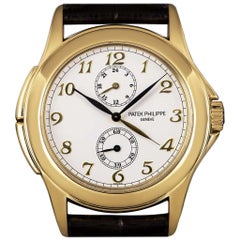 Patek Philippe Travel Time Gold White Dial 5134J-001 Manual Wind Watch