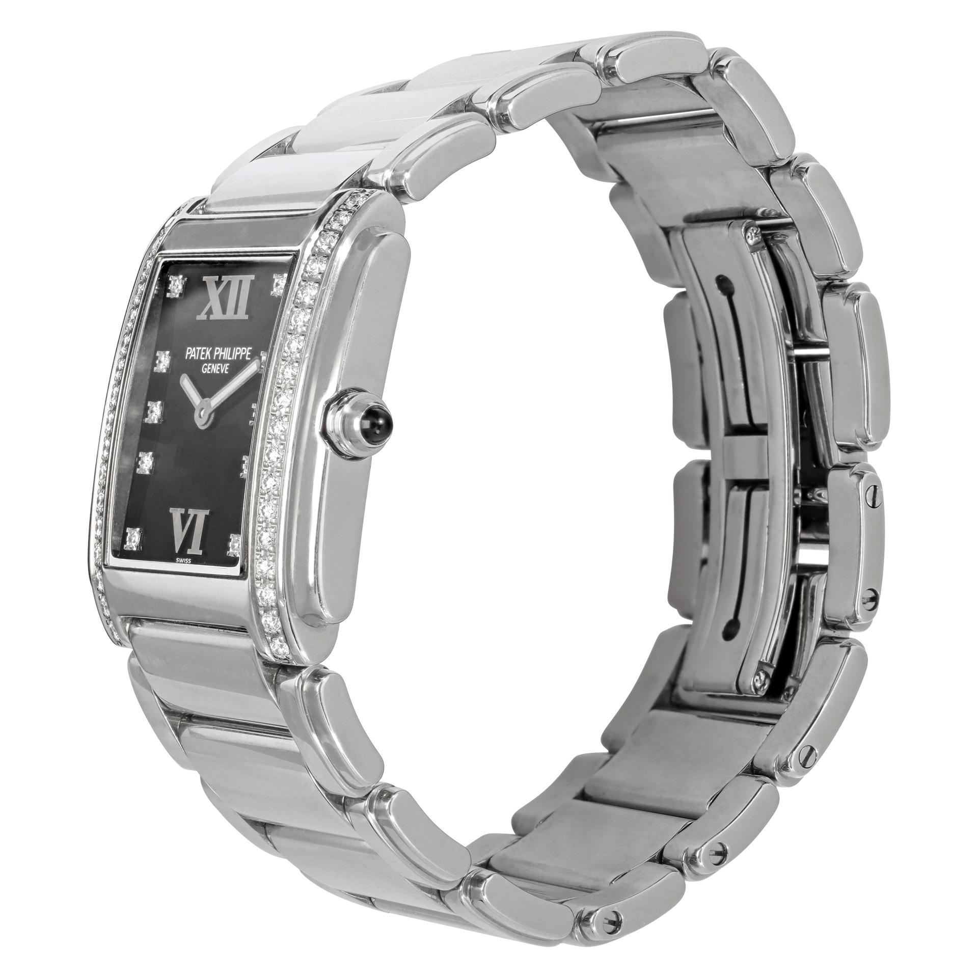 Patek Philippe Twenty-4 in stainless steel with factory diamond bezel and dial. Quartz. 30 mm length (lug to lug) by 25 mm width case size. Ref 4910/010. Fine Pre-owned Patek Philippe Watch.

 Certified preowned Dress Patek Philippe Twenty 4