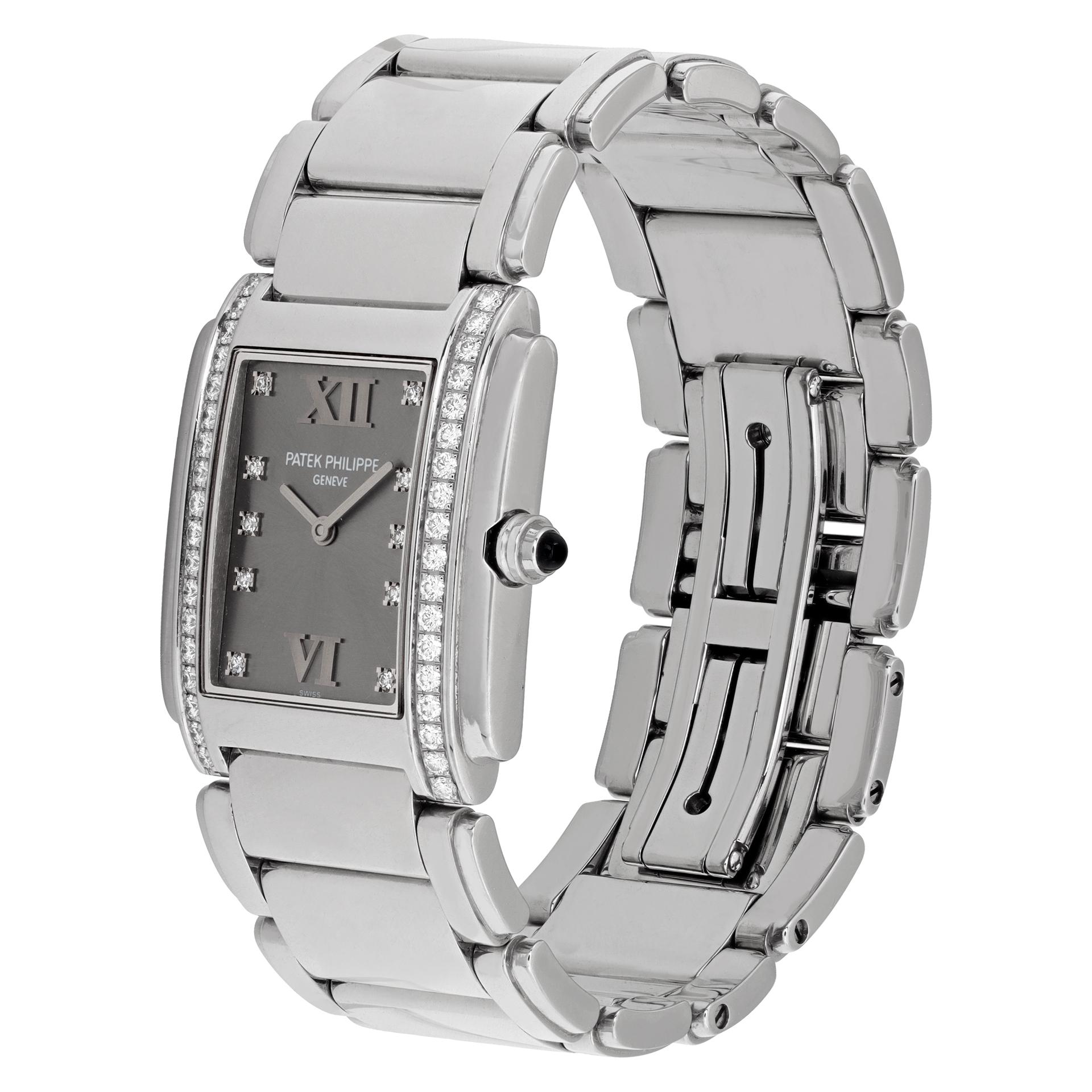 Patek Philippe Twenty 4 in stainless steel with factory diamond bezel and dial. Quartz. 30 mm length (lug to lug) by 25 mm width case size. Ref 4910. Fine Pre-owned Patek Philippe Watch.

 Certified preowned Dress Patek Philippe Twenty 4 4910 watch
