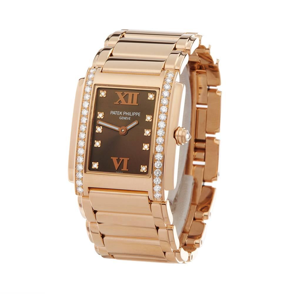 Ref: W4994
Manufacturer: Patek Philippe
Model: Twenty-4
Model Ref: 4910/11R
Age: 
Gender: Ladies
Complete With: Xupes Presentation Pouch
Dial: Chocolate & Diamond Markers
Glass: Sapphire Crystal
Movement: Quartz
Water Resistance: To Manufacturers