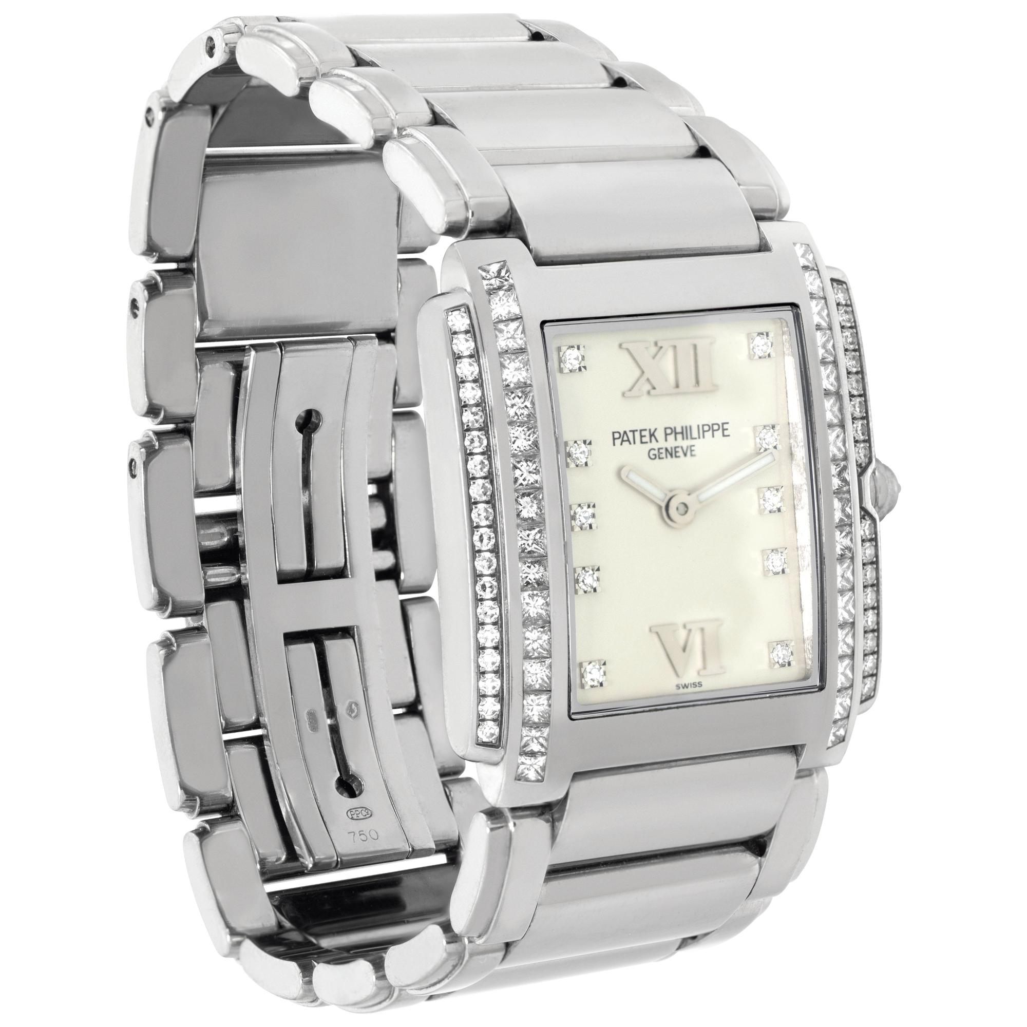 Patek Philippe Twenty 4 4910/20G in White Gold w/ a White dial 25mm Quartz watch In Excellent Condition For Sale In Surfside, FL
