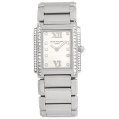 Vintage Patek Philippe Twenty 4 4910/20G in White Gold w/ a White dial 25mm Quartz watch