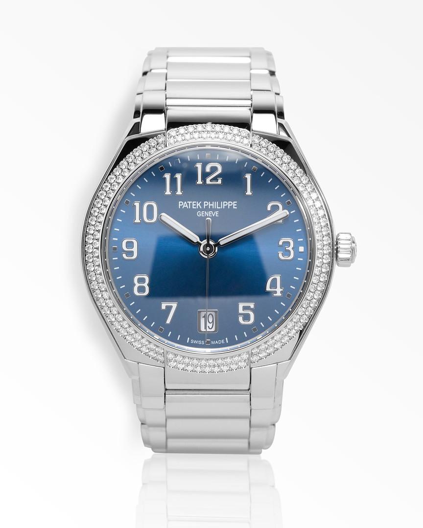 This feminine time-piece by Patek Philippe is referenced as the 7300-1200A-001, its highly polished, rounded shape case is crafted from stainless steel and measures 36 mm in diameter with a height of 10.05 mm, the bezel is elegantly set with 160
