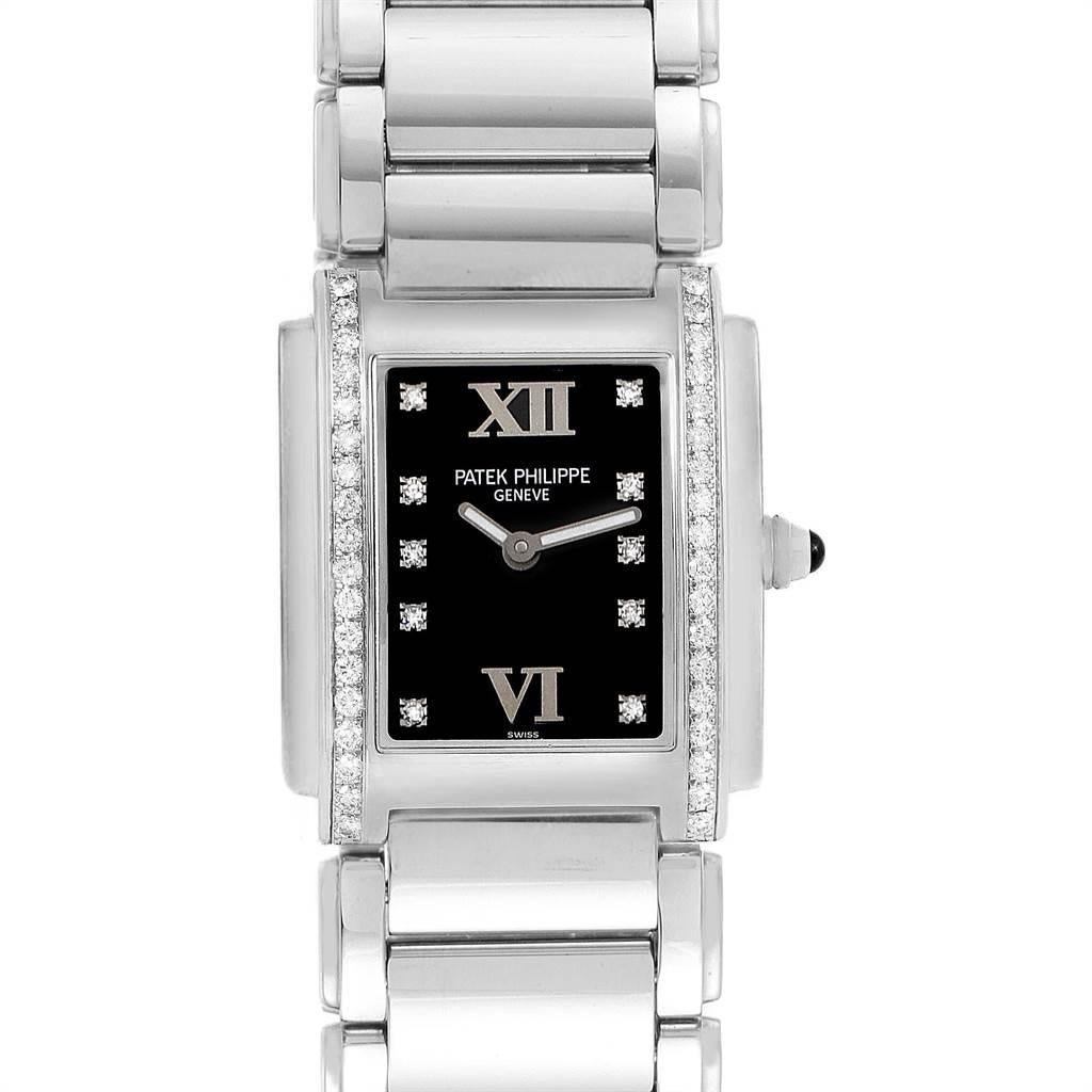 Patek Philippe Twenty-4 Black Diamond Dial Bezel Ladies Watch 4910. Quartz movement. Stainless steel case 25.0 x 30.0 mm. Onyx set crown. Original Patek factory 38 diamond bezel. Scratch resistant sapphire crystal. Black dial with original Patek