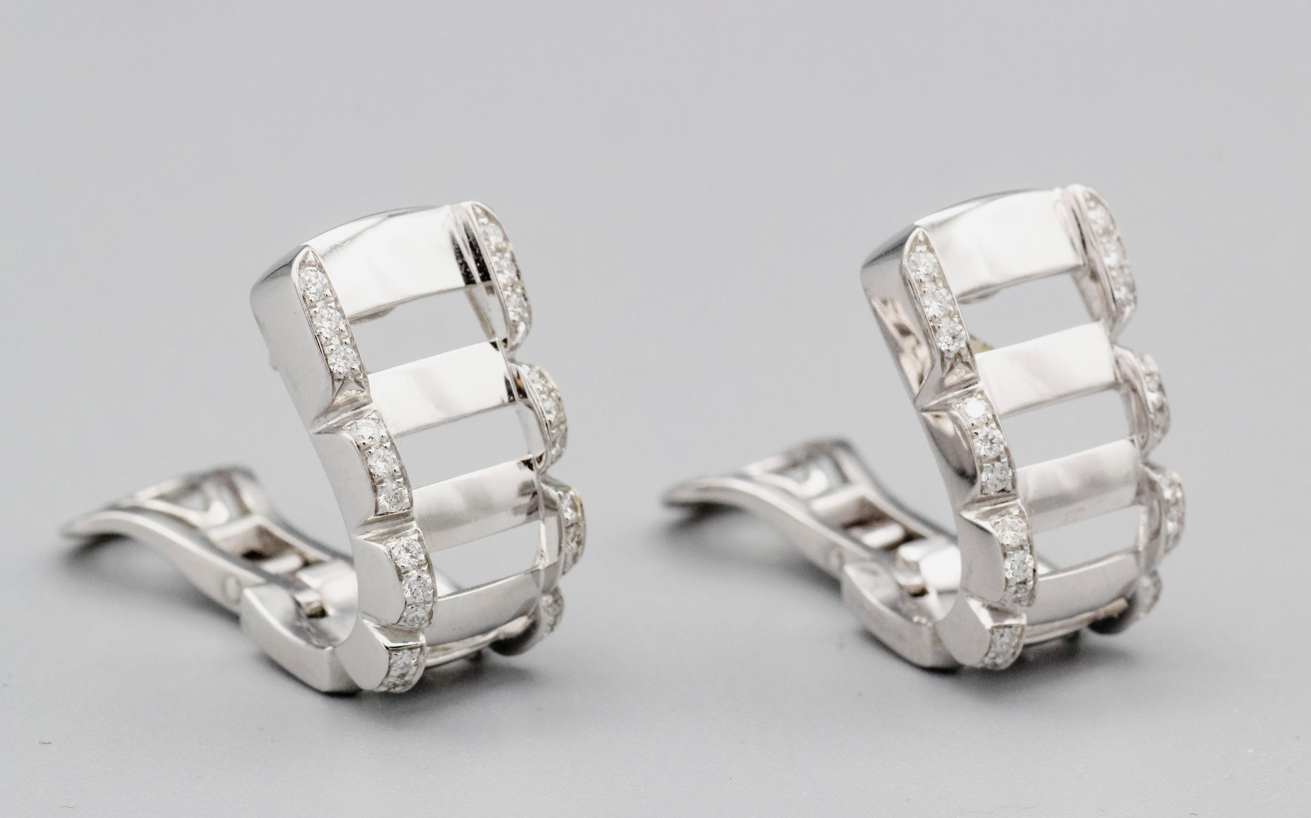 Elevate your elegance with the Patek Philippe Twenty-4 Diamond 18 Karat White Gold Hoop Earrings, a dazzling embodiment of luxury and sophistication. Crafted by the esteemed Swiss watchmaker Patek Philippe, these earrings are a stunning expression