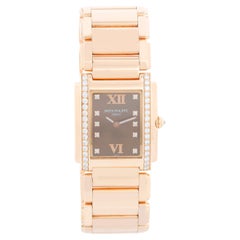 Patek Philippe Montre Twenty-4 pour femmes en or rose 18 carats et diamants 4910/11R