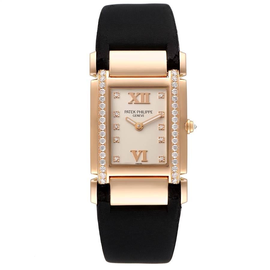 Patek Philippe Twenty-4 Rose Gold Black Strap Diamond Ladies Watch 4920R. Quartz movement. 18K rose gold case 30 x 25 mm. Original Patek factory diamond bezel. Scratch resistant sapphire crystal. Silvered dial with Original Patek factory diamond