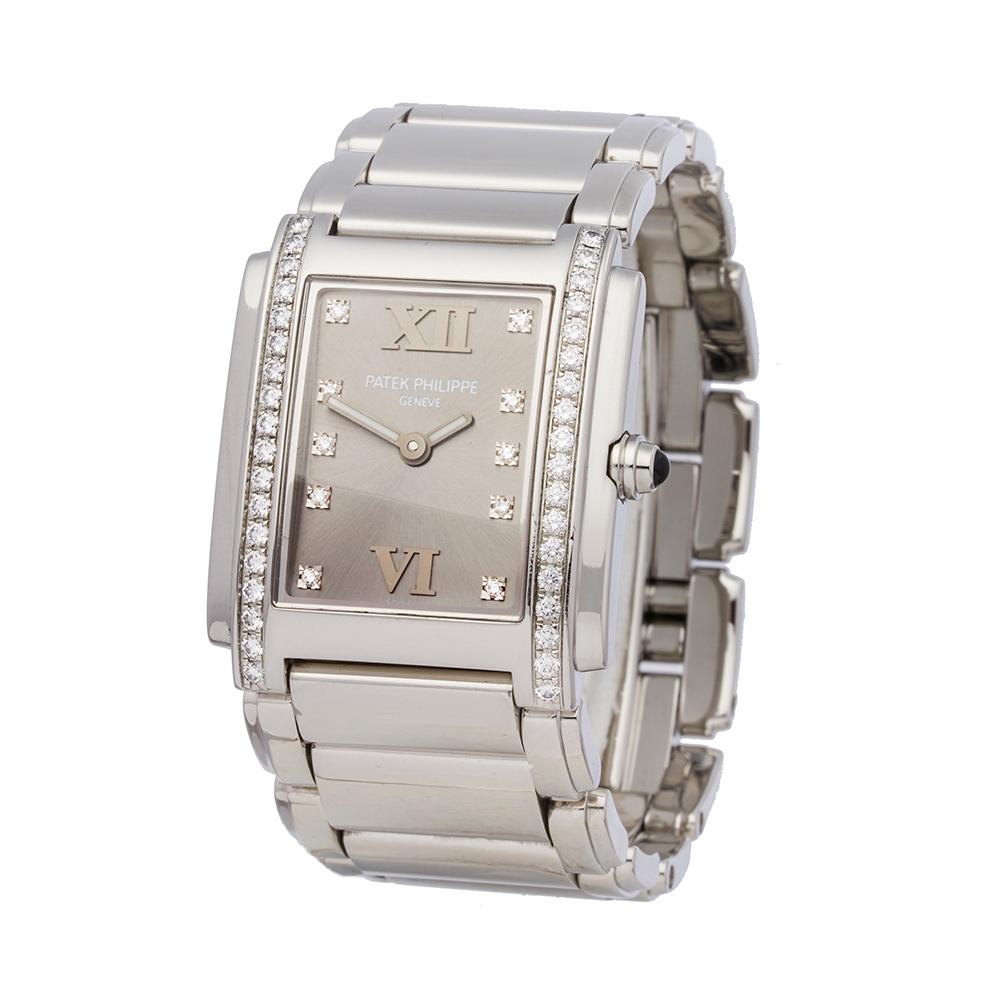 Reference: COM1865
Manufacturer: Patek Philippe
Model: Twenty-4
Model Reference: 4910/10A
Age: Circa 2010's
Gender: Women's
Box and Papers: Presentation Box
Dial: Grey With Diamonds
Glass: Sapphire Crystal
Movement: Quartz
Water Resistance: To