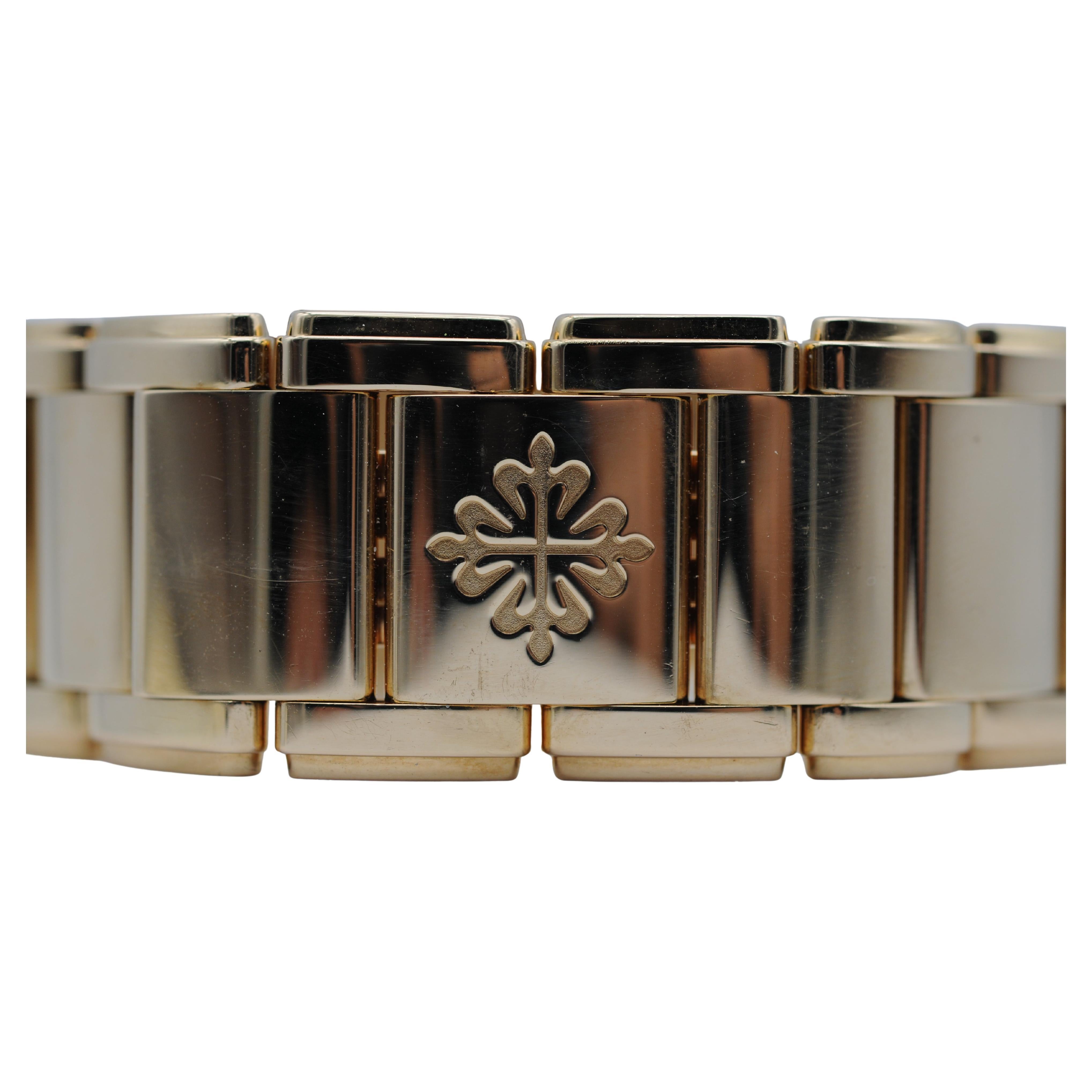 Patek Philippe Twenty~4 4910 in 18k yellow gold and diamond In Good Condition For Sale In Berlin, BE