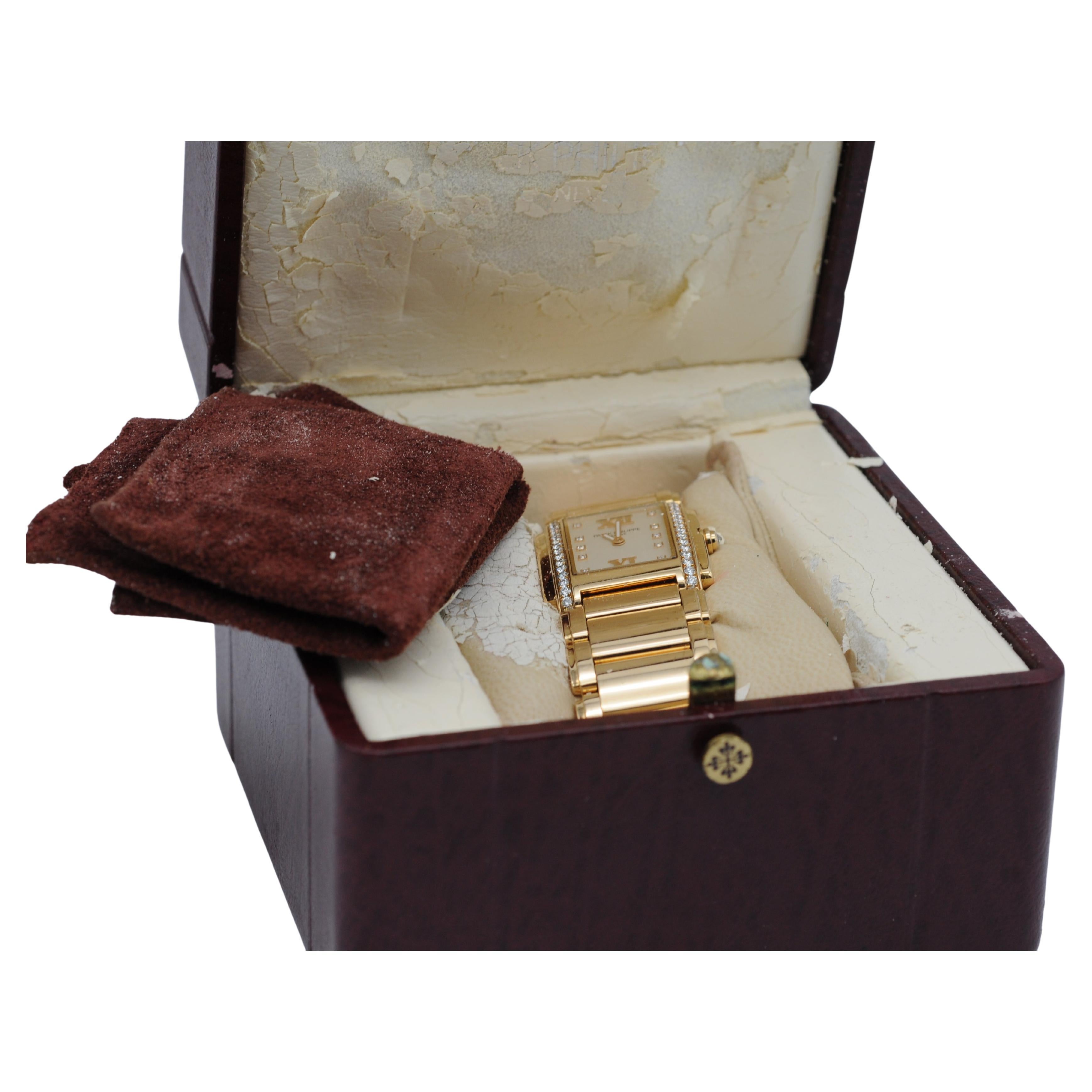 Patek Philippe Twenty~4 4910 in 18k yellow gold and diamond For Sale 3