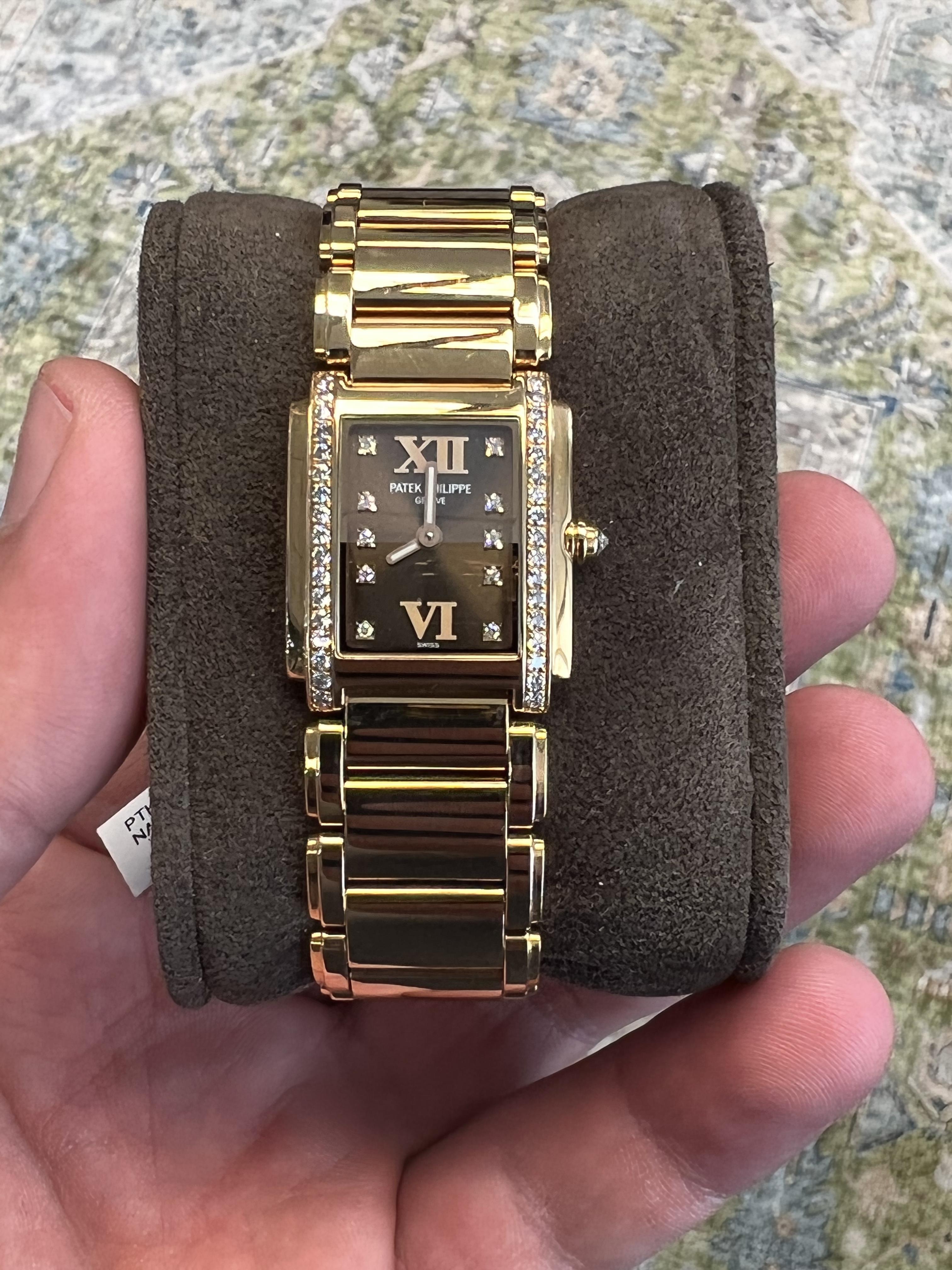 BRAND: Patek Philippe
MODEL: Twenty-4
CASE: 18k Rose Gold
DIAL: Brown
BAND: 18k Rose Gold
WRIST SIZE: Apx. 