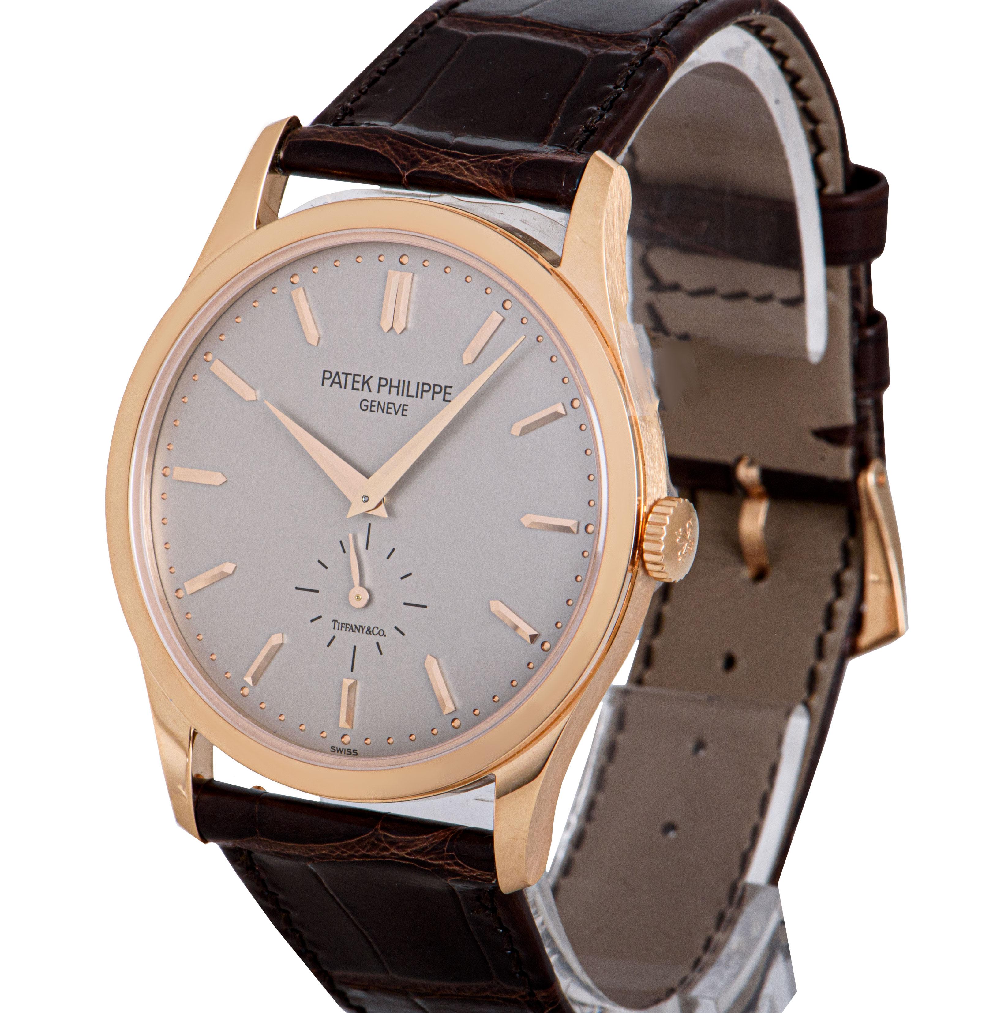 A 37 mm Unworn 18k Rose Gold Calatrava Gents Wristwatch, double name Tiffany & Co. silvery gray dial with applied hour markers, small seconds at 6 0'clock, a fixed 18k rose gold bezel, an original chocolate brown leather strap with an original 18k