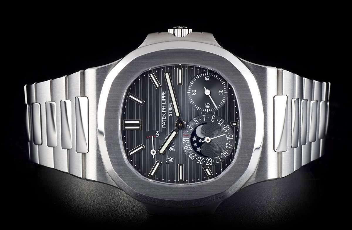 Patek Philippe Unworn Nautilus Stainless Steel Black-Blue Dial B&P 5712/1A-001 In New Condition In London, GB