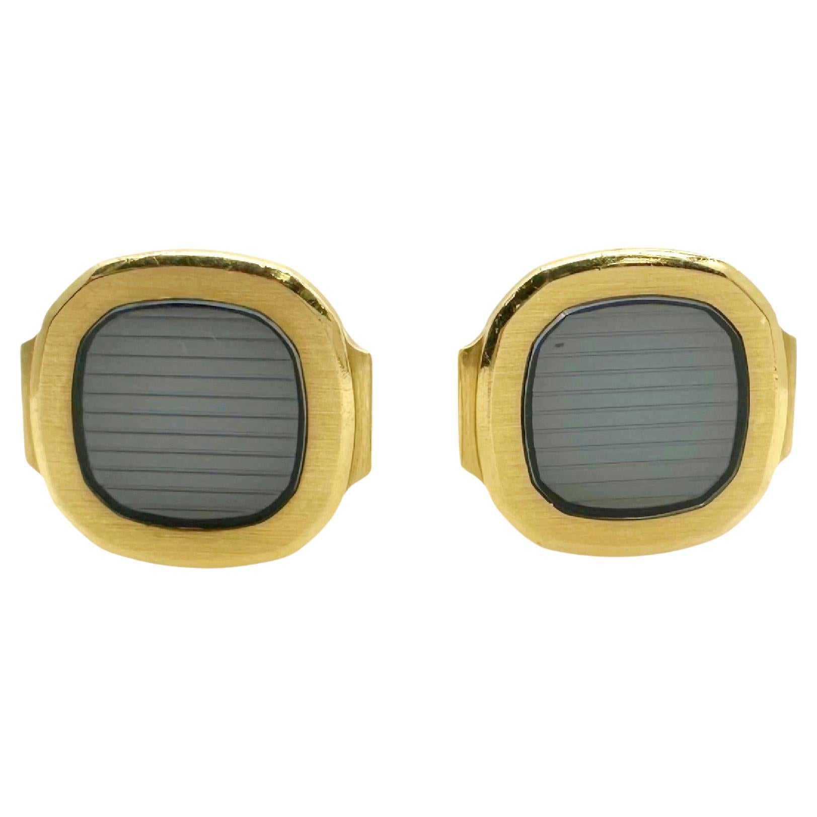 Patek Philippe Vintage Nautilus 18kt Yellow Gold & Sapphire Crystal Cuff Links