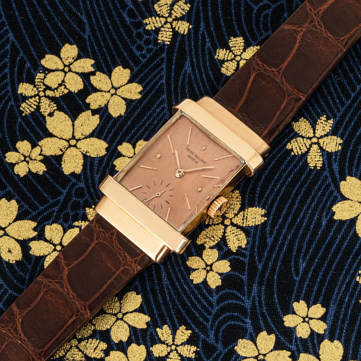 A vintage Patek Philippe Top Hat in rose gold, in excellent condition. Features a copper-coloured dial with a small seconds display at 6 o'clock. The brand new generic brown leather strap comes with an original Patek Philippe pin buckle. Fitted with