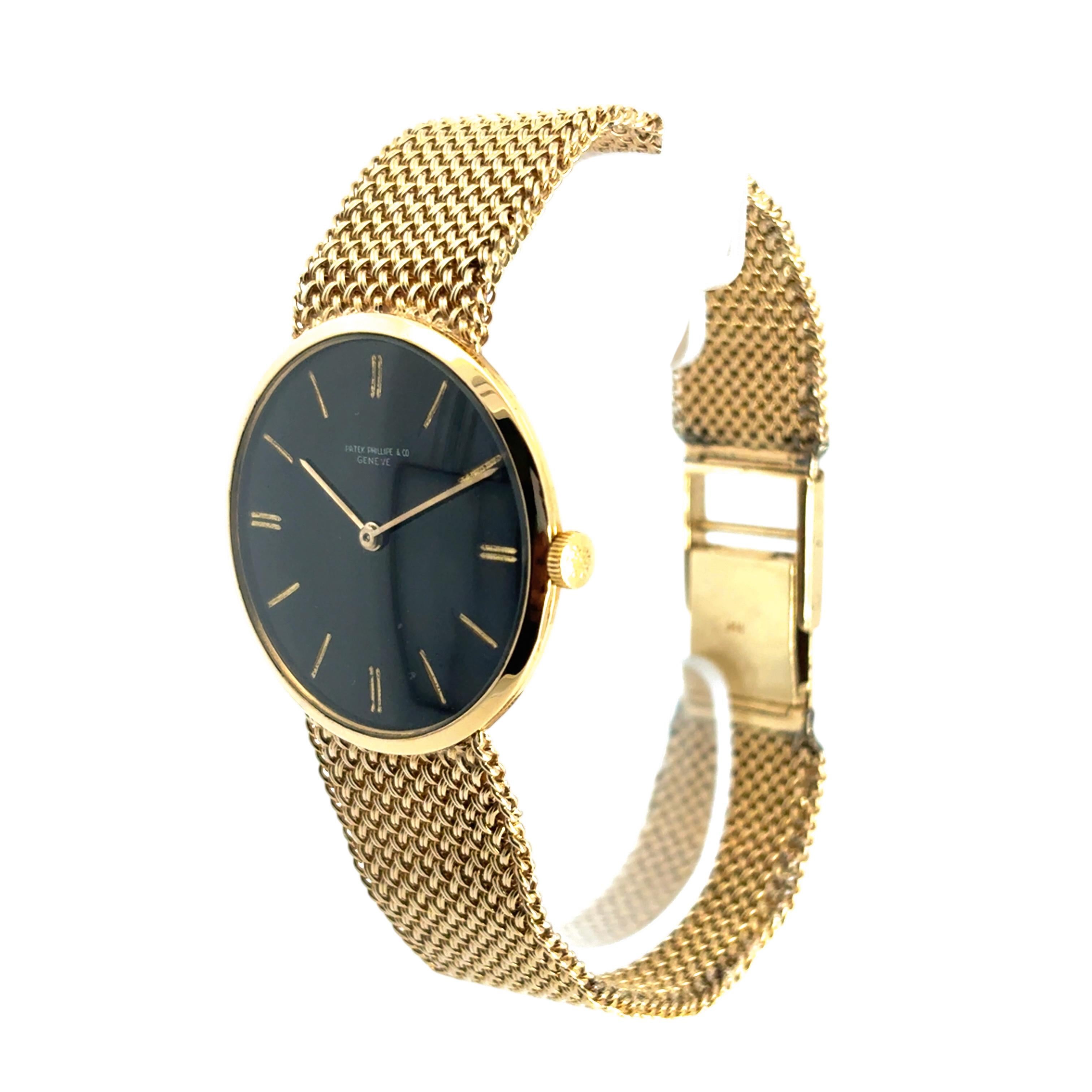 Patek Philippe Vintage Watch 18k Yellow Gold Black Dial Aftermarket 14k Bracelet In Excellent Condition For Sale In Boca Raton, FL