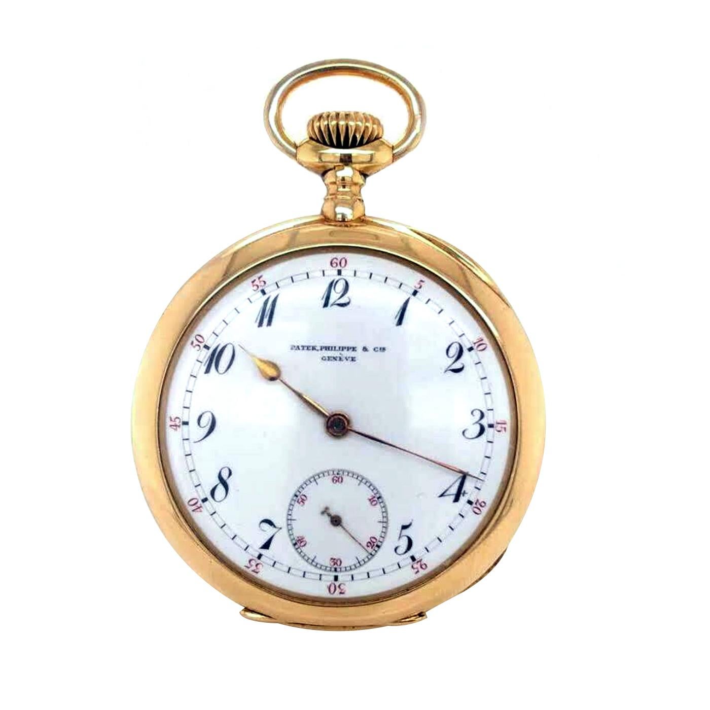 Patek Phillipe 18K Yellow Gold Pocket Watch Manual-wind movement, Guillaume balance, 18k yellow gold case, White enamel dial with black Breguet numerals, subsidiary seconds. There is a dust ring running from the inside edge of the band down to the