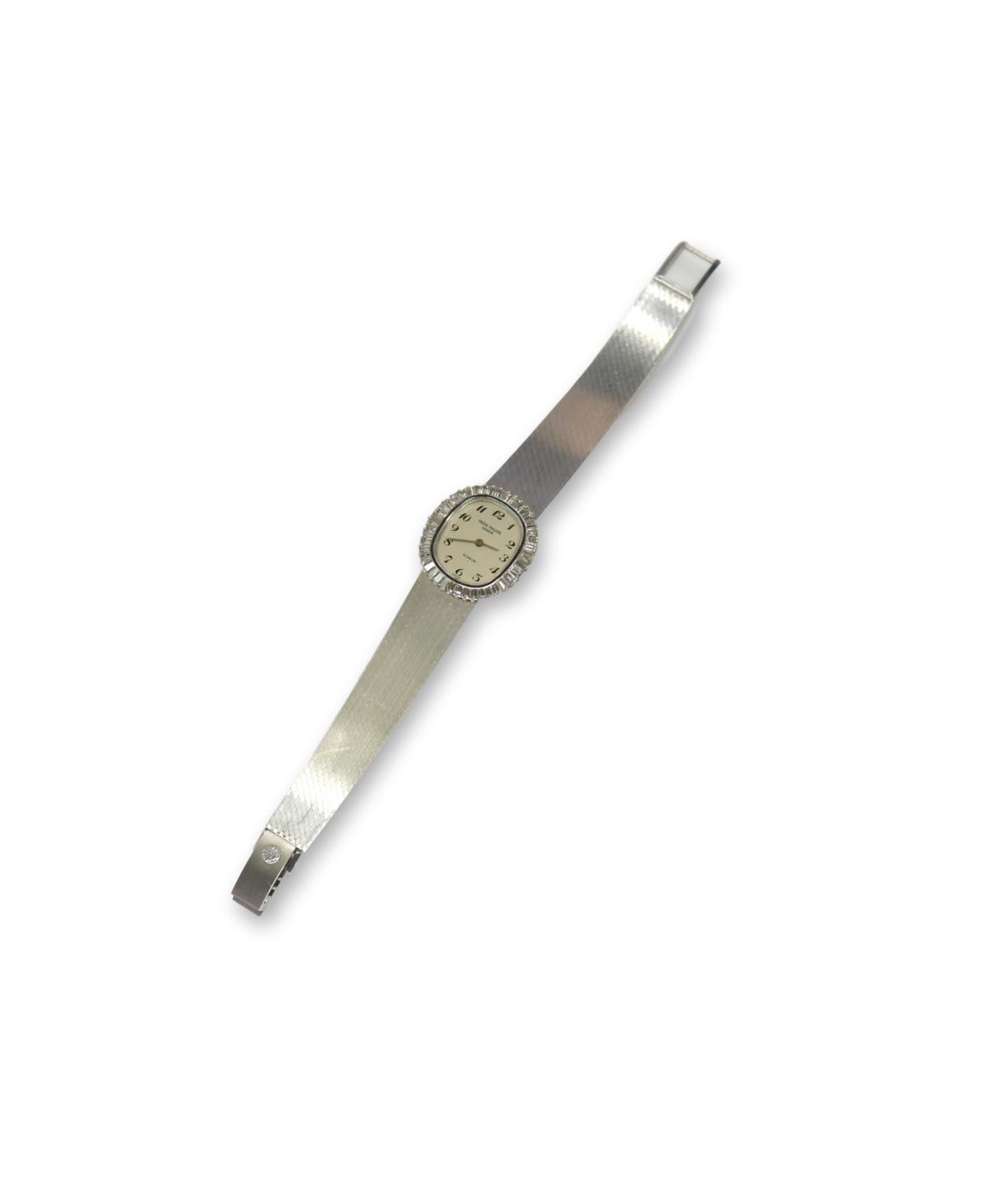 Women's Patek Philippe White Gold Baguette Diamond Bracelet Manual Wind Watch 'Ref 4138' For Sale