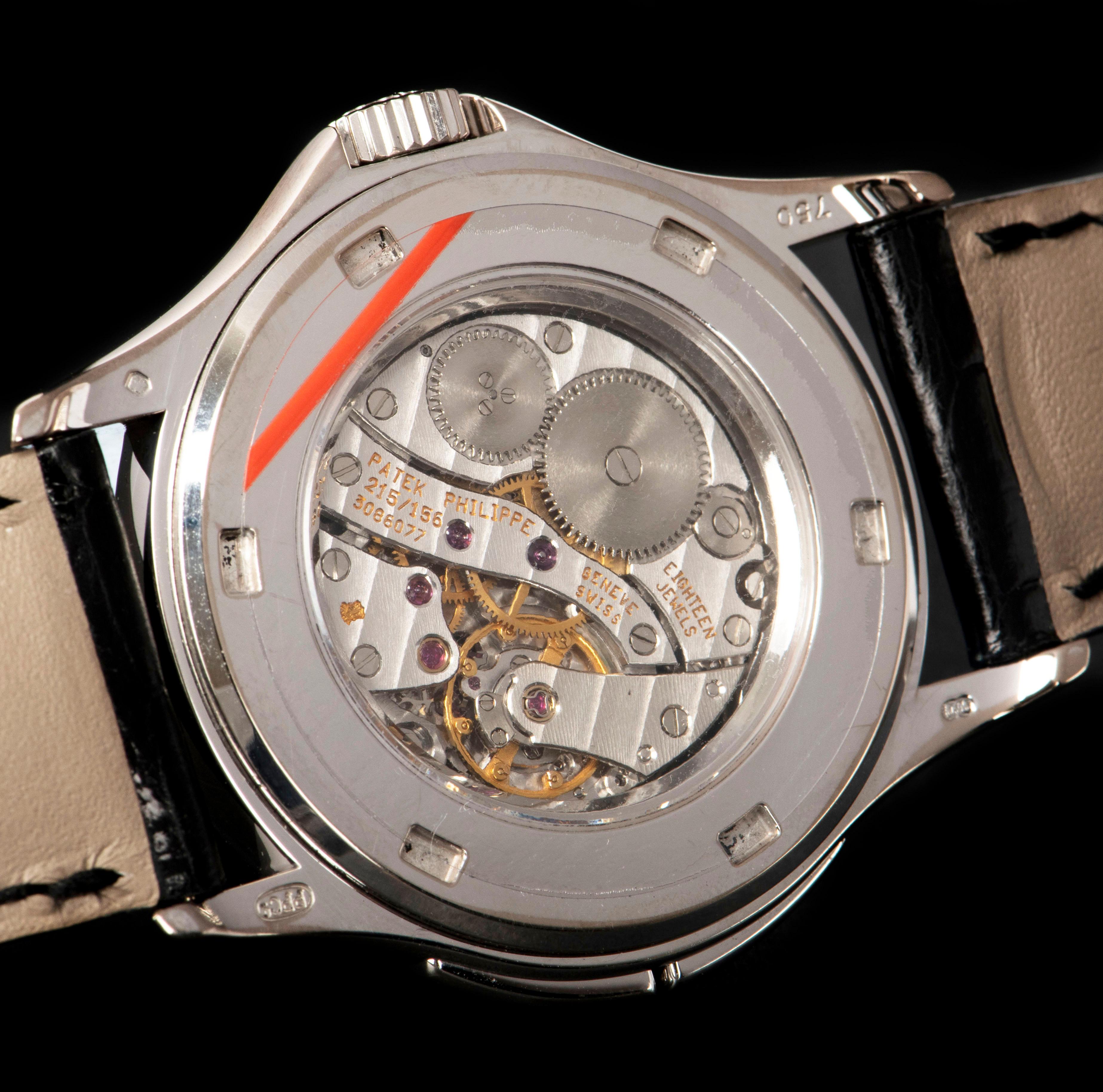 Men's Patek Philippe White Gold White Dial Travel Time Manual Wristwatch Ref 5134G