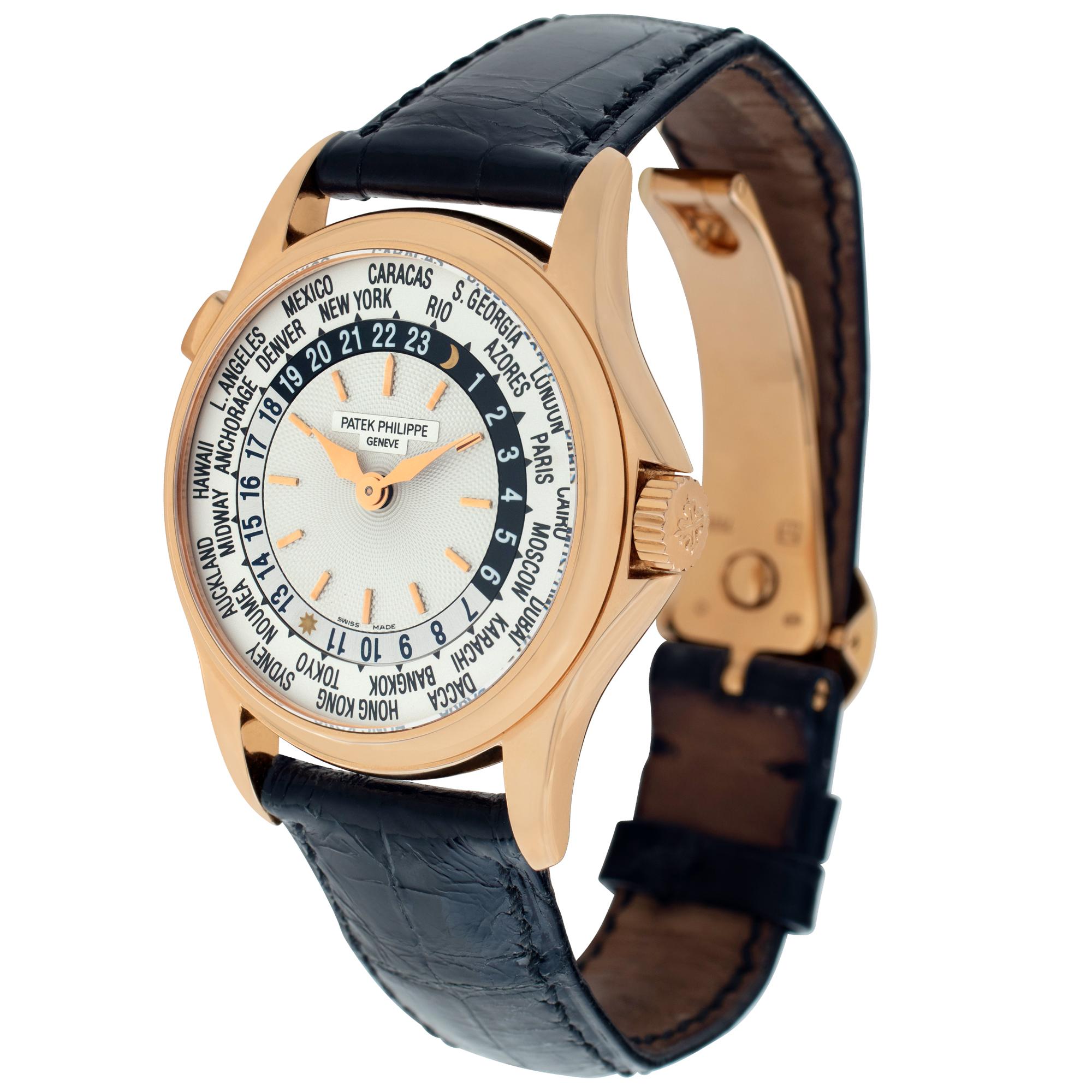 Patek Philippe World Time in 18k rose gold on a black alligator strap with deployant buckle. Auto movement under glass with world time. 37 mm case size. Ref 5110r. Circa 2000s. Fine Pre-owned Patek Philippe Watch. Certified preowned Dress Patek