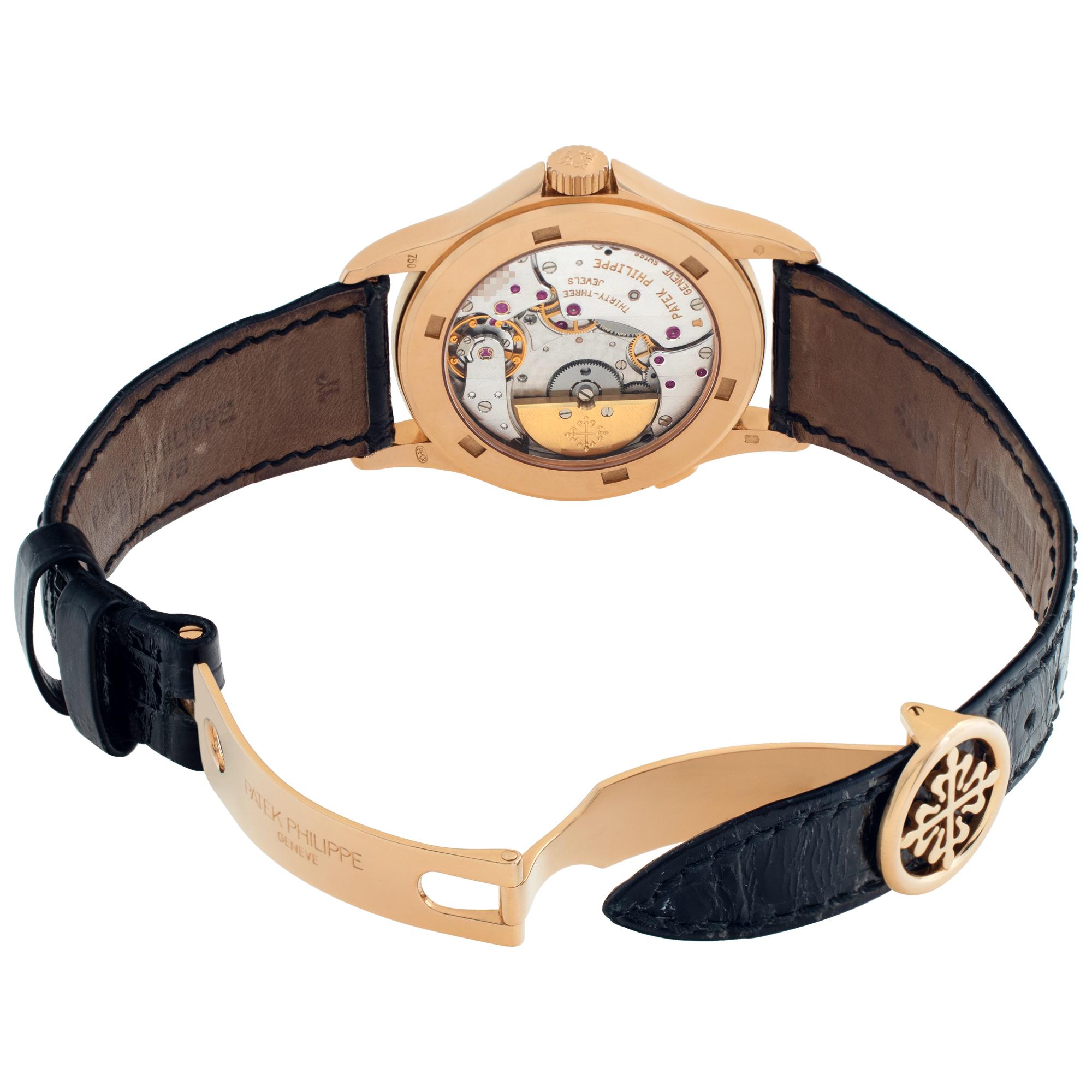 Patek Philippe Montre-bracelet World Time en or rose 18 carats, réf. 5110r Pour hommes en vente