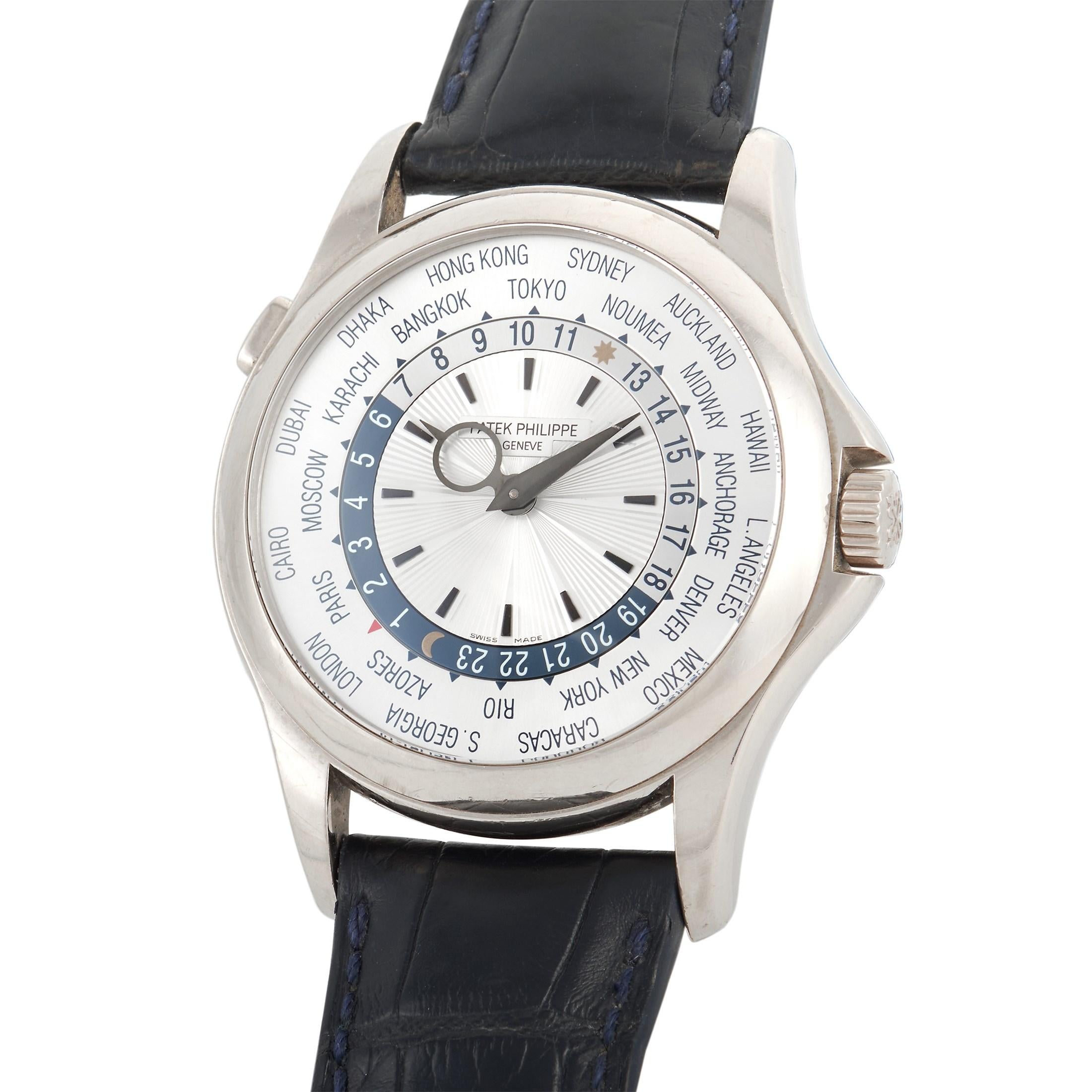 Patek Philippe World Time Watch, reference number 5130G-001, is a spectacular timepiece that will make sure you are always on schedule. 

Captivating in design, this watch begins with a 40mm case and bezel crafted from 18K White Gold. On the silver