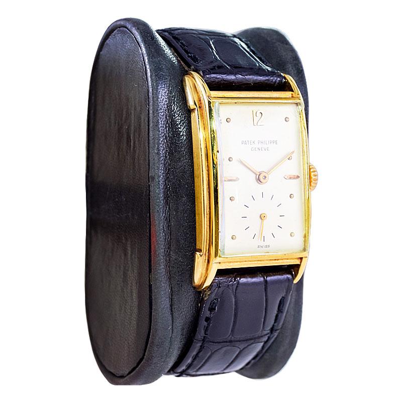 FACTORY / HOUSE: Patek Philippe and Company
STYLE / REFERENCE: Art Deco / Tank
METAL / MATERIAL: 18Kt. Yellow Gold
DIMENSIONS: Length 39mm X Width 23mm
CIRCA: 1947 / 48
MOVEMENT / CALIBER: Manual Winding / 18 Jewels / 8 Adjustments / Cal. 9-90
DIAL