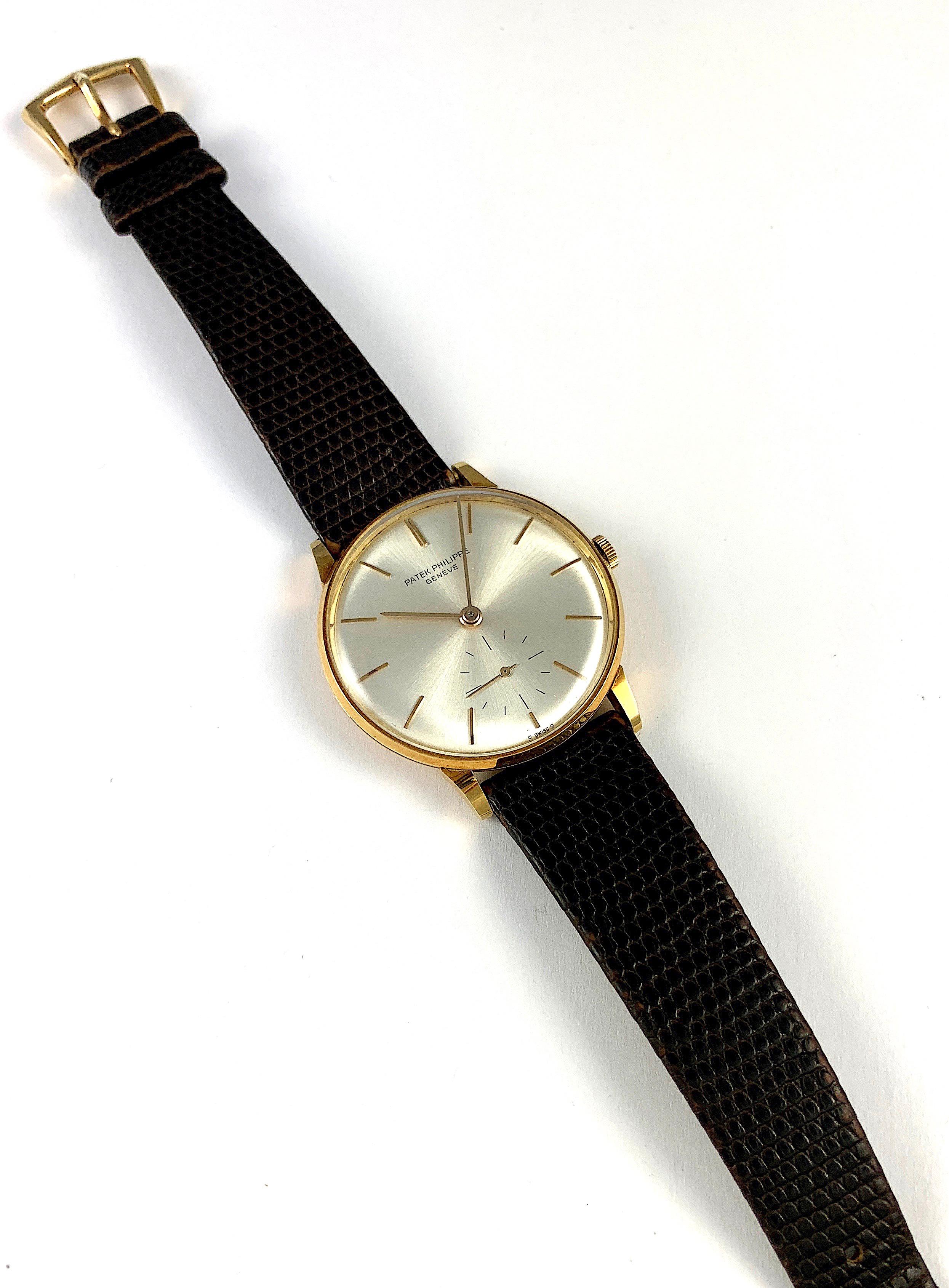 Patek Philippe 18K Yellow Gold Manual Wind Watch
Patek Philippe Reference 3420
Claw Lugs
Signed Movement and Inner Case Back
Manual Movement 
Original Silver Sunburst Dial 
Circa Late 1950s
Size: 34mm
Fitted on a Brand New Patek Philippe Original