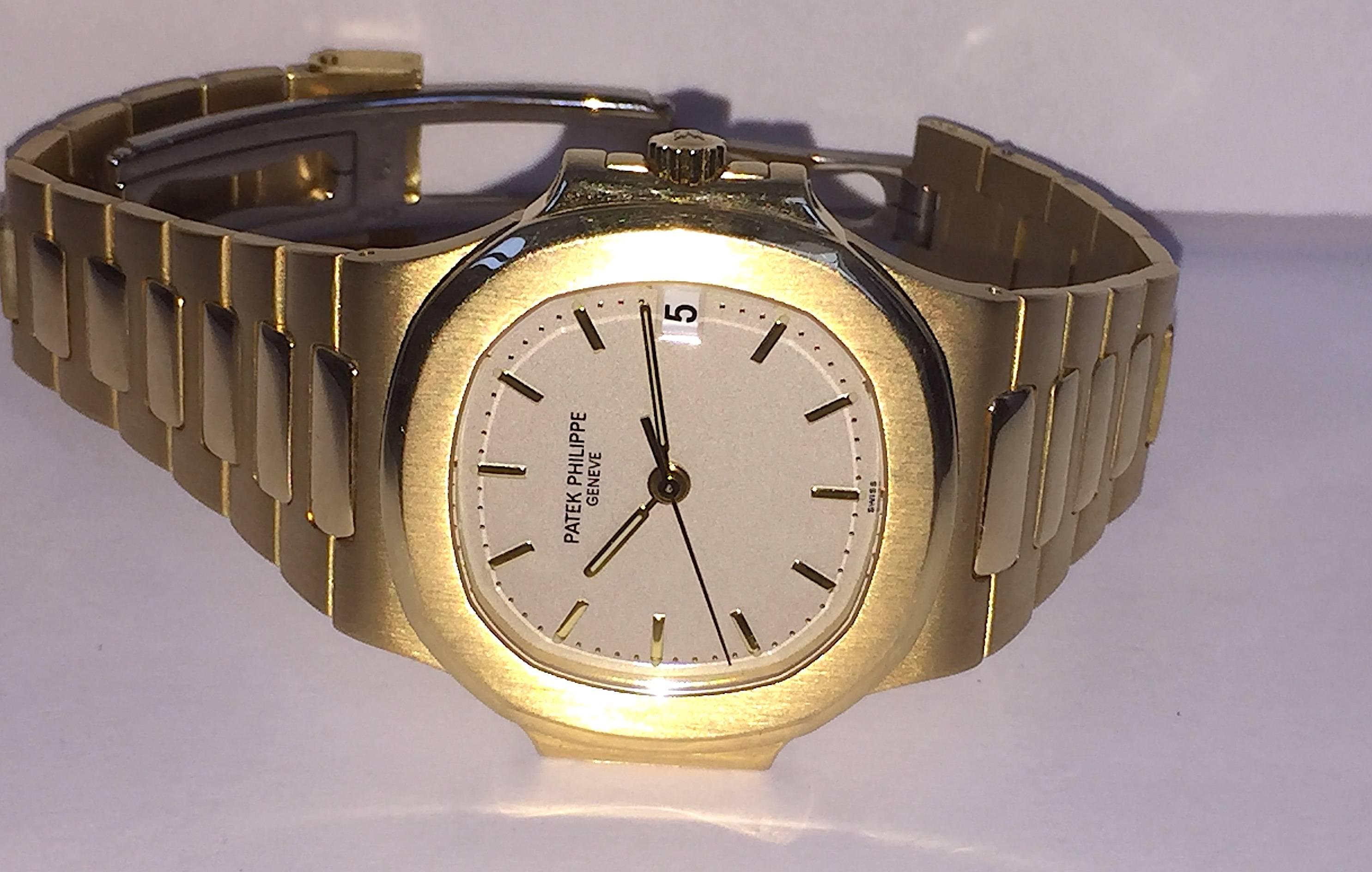 Women's or Men's Patek Philippe Yellow Gold Nautilus Automatic Wristwatch For Sale