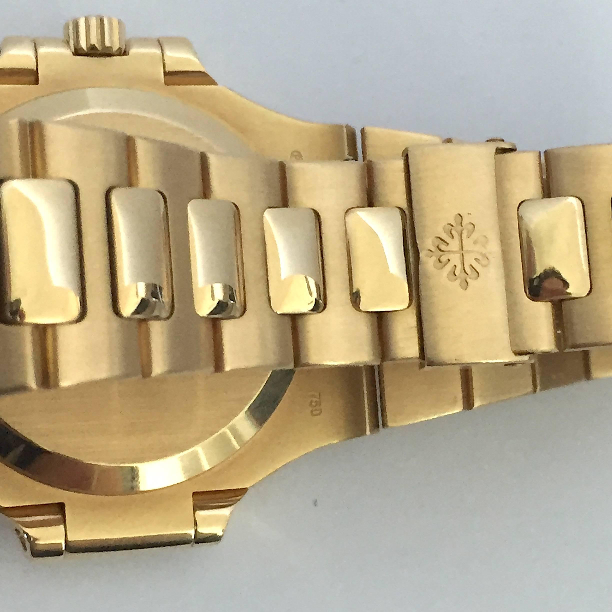 Patek Philippe Yellow Gold Nautilus Automatic Wristwatch For Sale 2