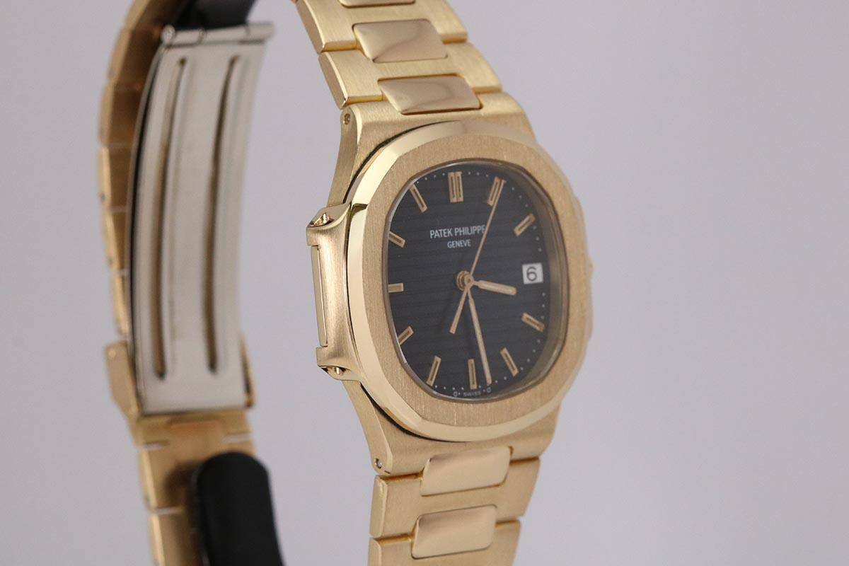 Patek Philippe Yellow Gold Nautilus Quartz Wristwatch Ref 3900/1, circa 1990s 2