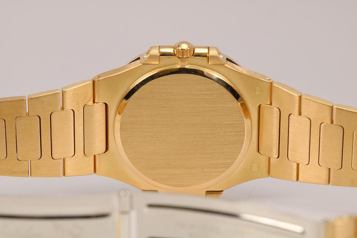 Patek Philippe Yellow Gold Nautilus Quartz Wristwatch Ref 3900/1, circa 1990s 3