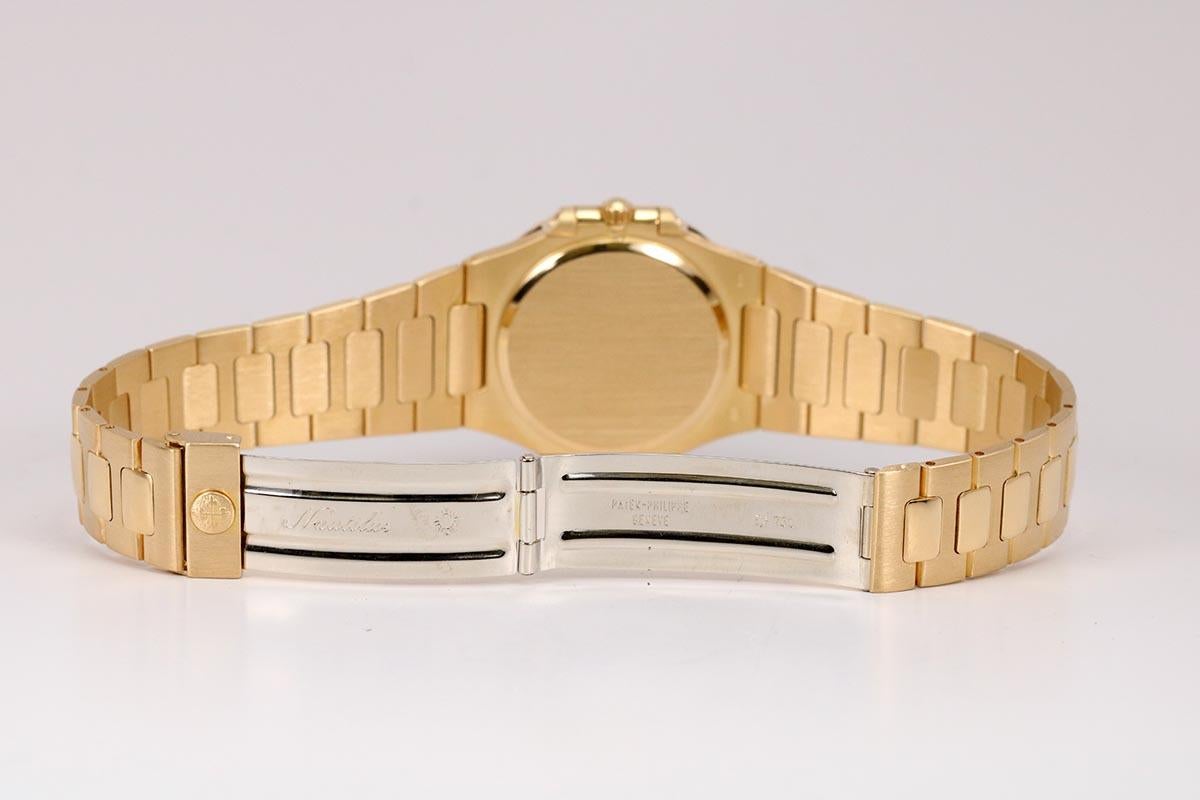 Patek Philippe Yellow Gold Nautilus Quartz Wristwatch Ref 3900/1, circa 1990s 4