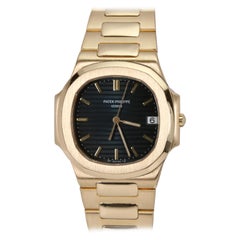 Vintage Patek Philippe Yellow Gold Nautilus Quartz Wristwatch Ref 3900/1, circa 1990s