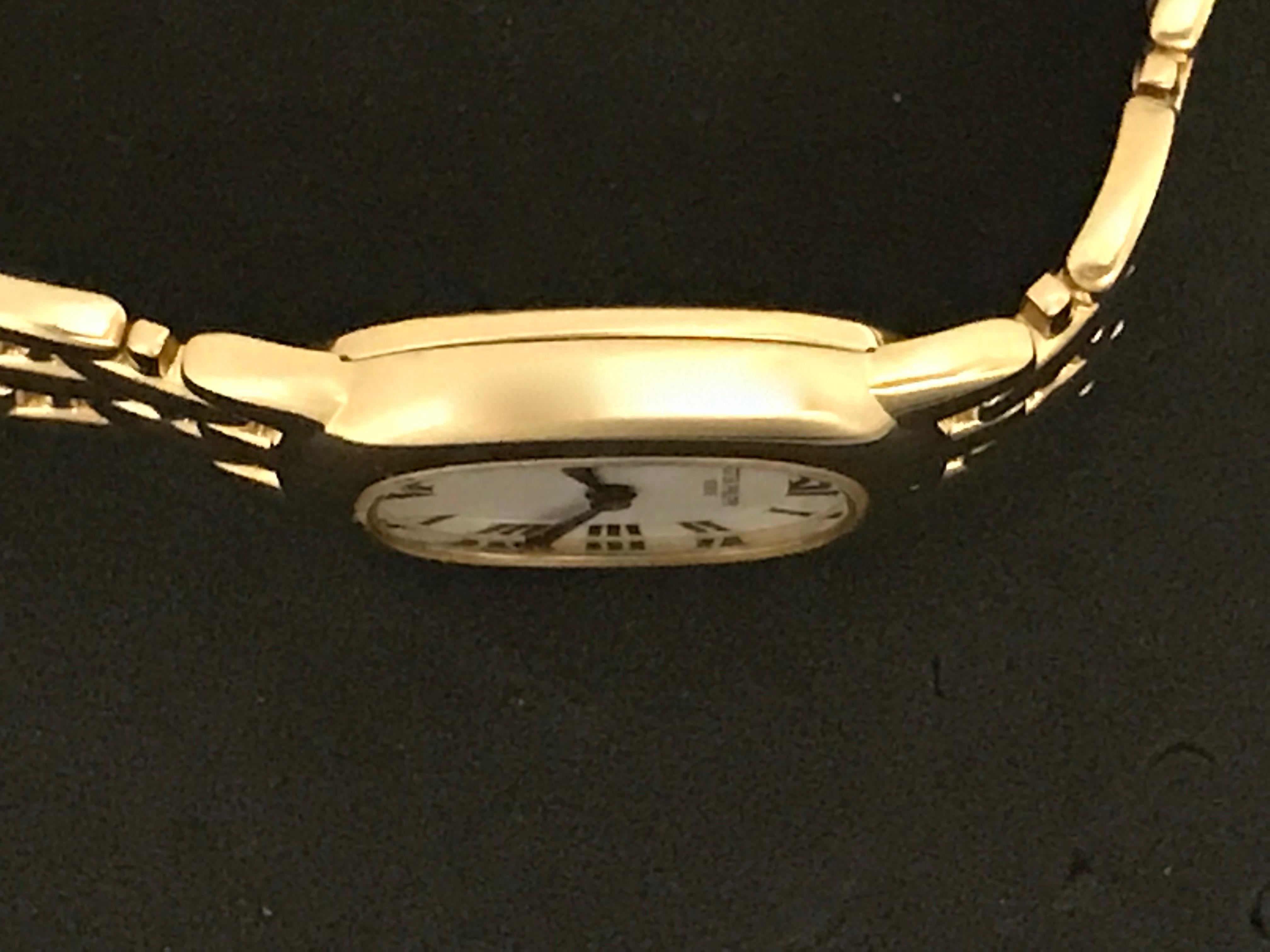 Women's Patek Philippe Yellow Gold White Dial Ellipse Quartz Wristwatch