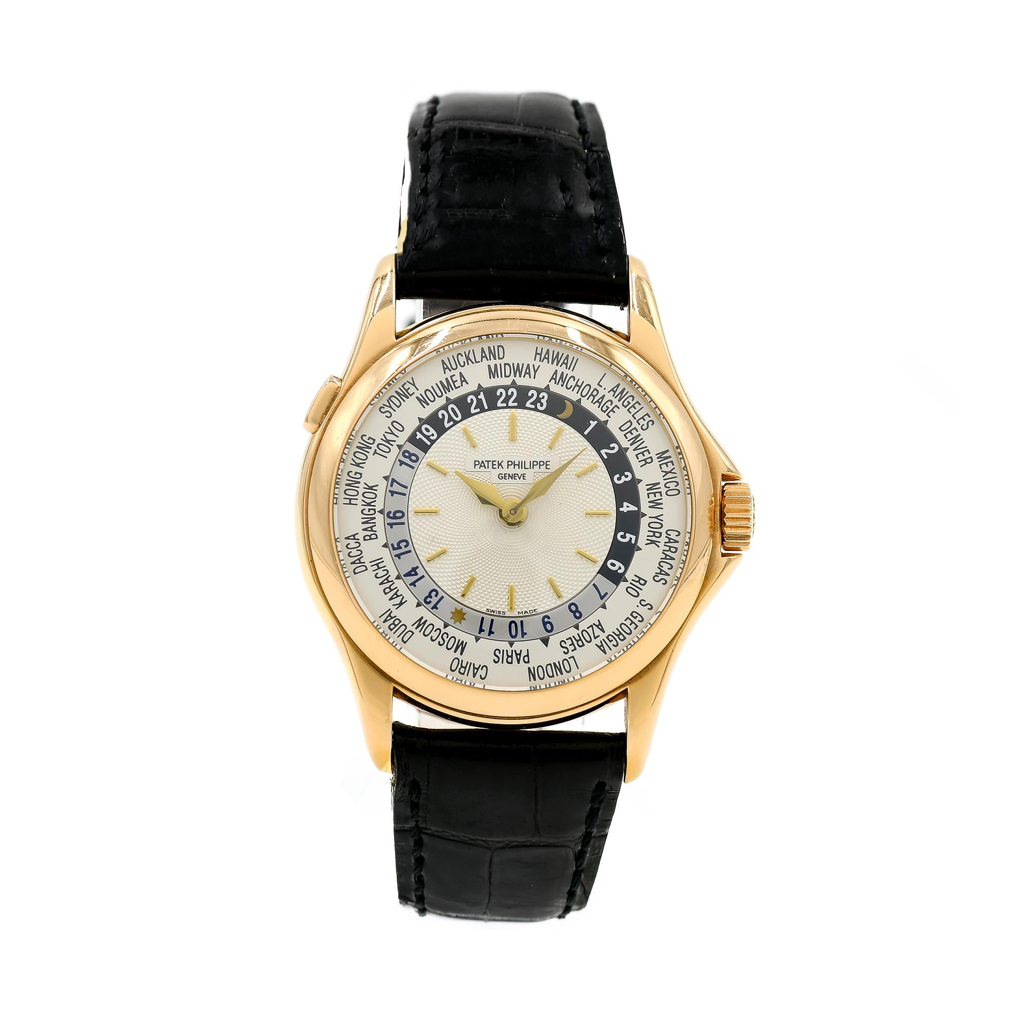 Patek Philippe 18k yellow gold World Time wristwatch, Ref. 5110J, automatic movement. Patek Philippe strap. Box included but no papers. 

18k Yellow Gold 
Length: 45mm 
Width: 36mm 
Strap width at case: 20mm 
Case thickness: 9.8mm 
Buckle: 18k