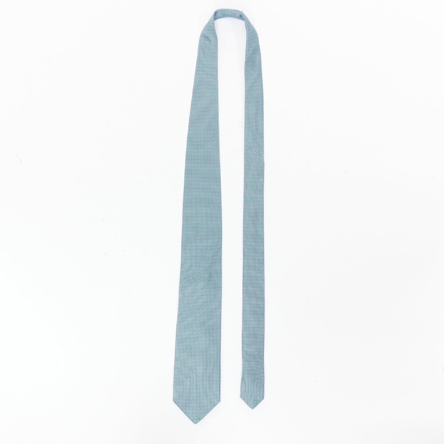 PATEK PHILLIPE 2011 100% silk blue grid jacquard wide dress tie
Reference: CNLE/A00402
Brand: Patek Phillipe
Collection: 2011
Material: Silk
Color: Blue
Pattern: Solid
Lining: Blue Silk
Made in: France

CONDITION:
Condition: Excellent, this item was