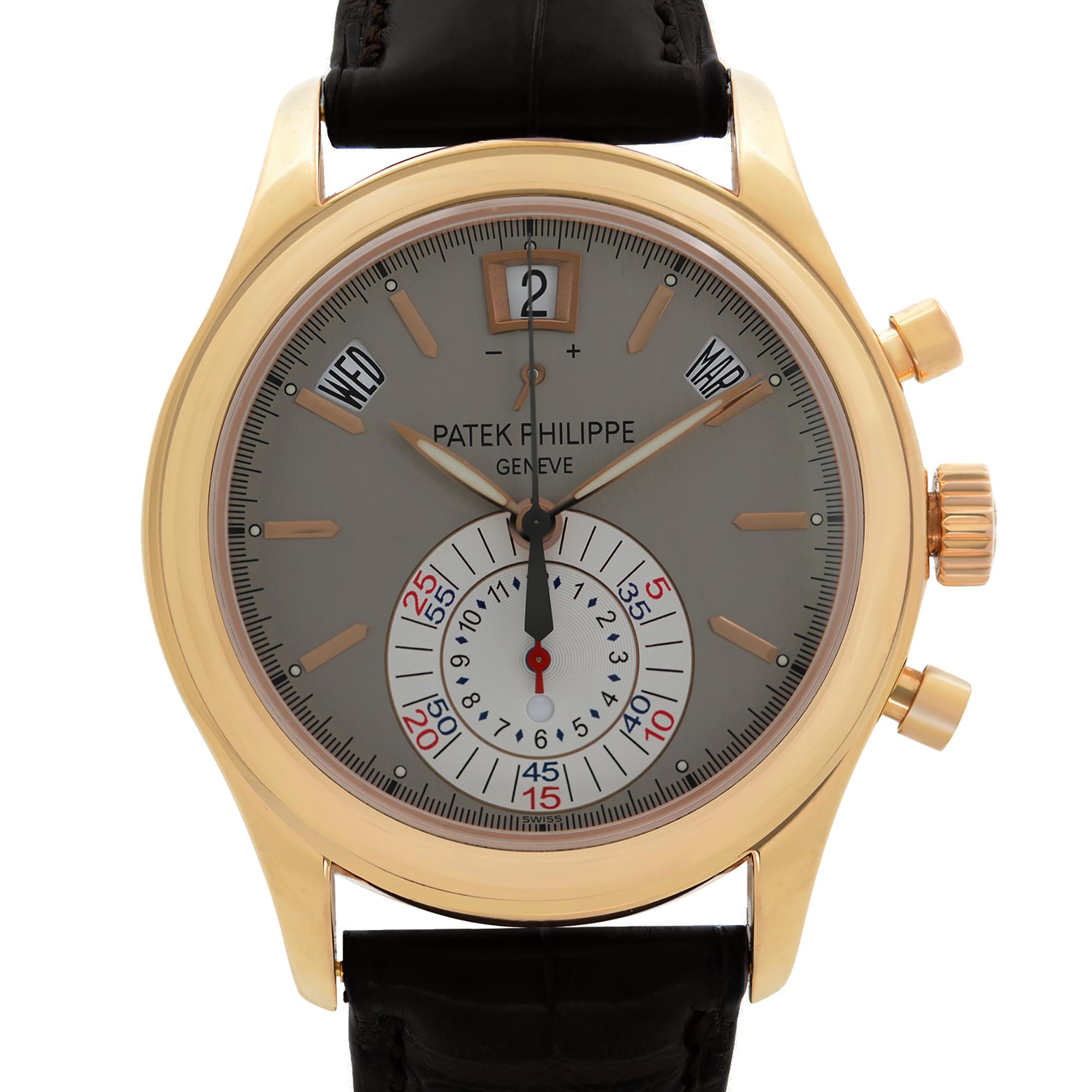 Pre-owned Patek Philippe 18K Rose Gold Silver-Gray Dial Automatic Men's Watch 5960R-001.  Power reserve Indicator, Annual calendar, Deployant Buckle.  This Beautiful Timepiece Features: 18k Rose Gold Case With a Brown Leather Strap, Fixed 18k Rose