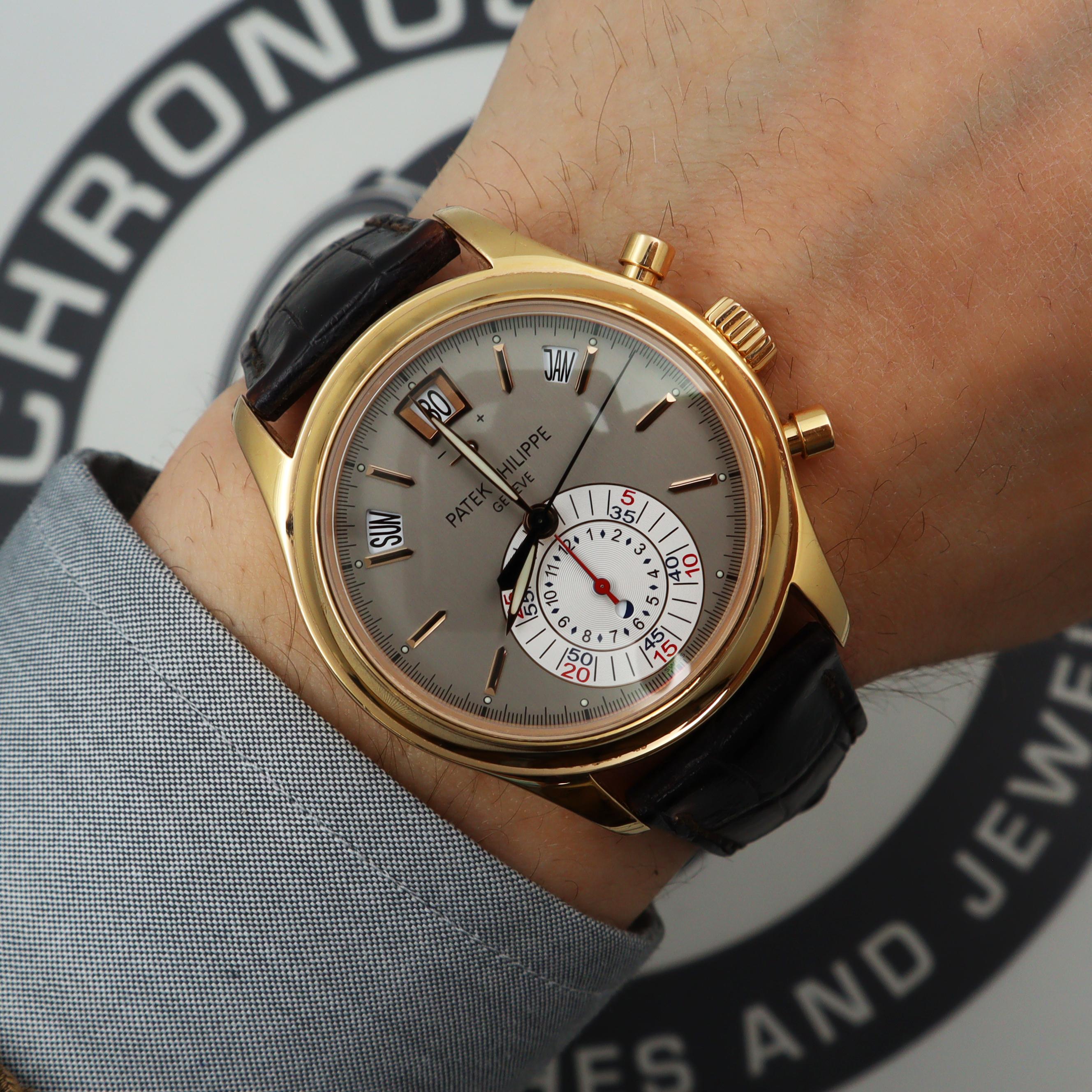 Patek Phillipe Annual Calendar 18K Rose Gold Gray Dial Automatic Watch 5960R-001 In Excellent Condition In New York, NY