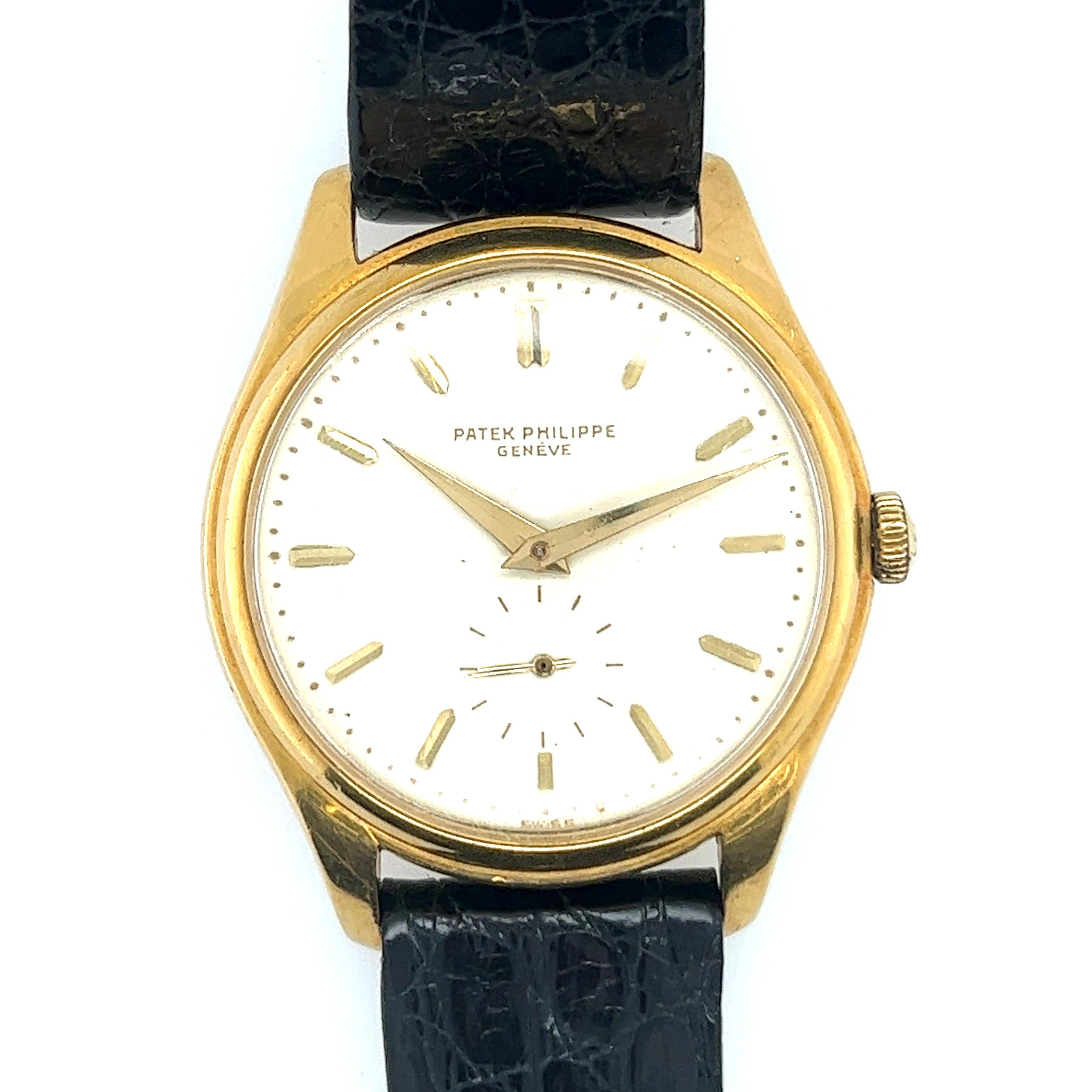 This pre owned Patek Philippe Calatrava Ref 3919  is considered to be the ultimate Vintage Patek watch. It has a Porcelain enamel dial, screw down back and  is water resistant. It has an  18k yellow gold case and is stamped on the back with 18k.  It