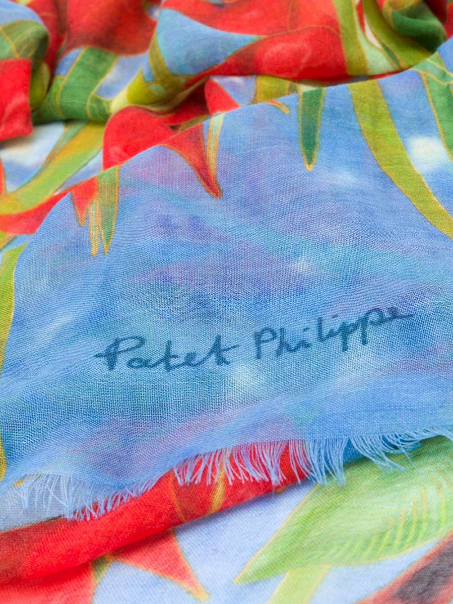 Charming Patek Phillipe Cashmere Scarf, in hues of blue with a crimson and green floral design. 

Colour: Red/ Blue / Green

Composition: 100% Cashmere

Measurements: Length: 195cm, Width: 110cm

Condition: 9.5/10, Excellent Overall Condition
The