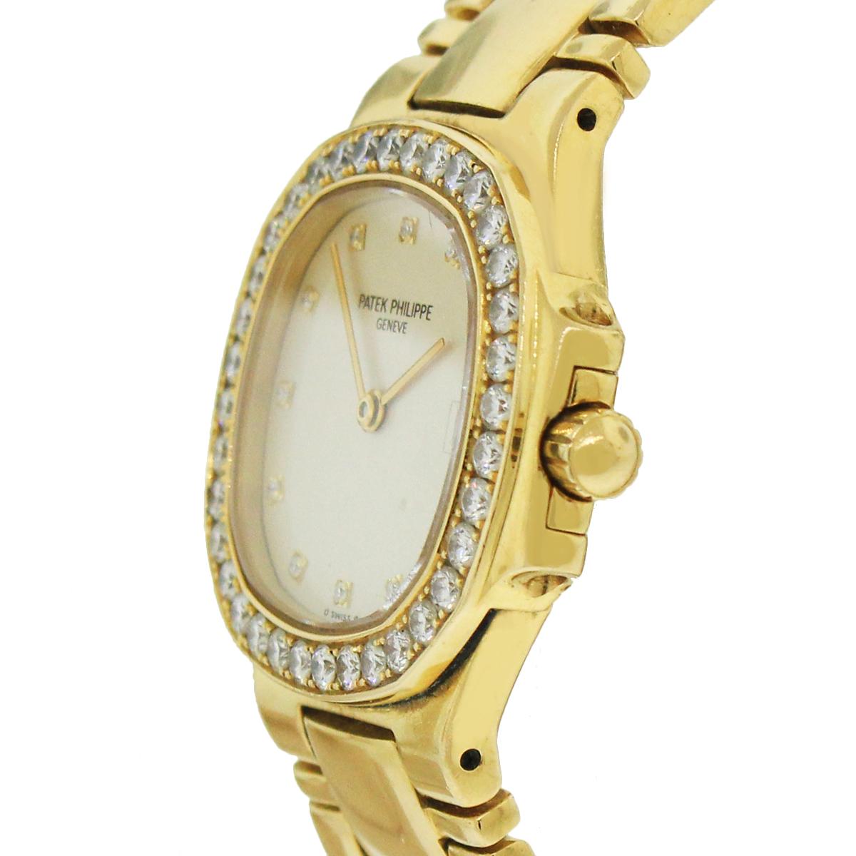 Brand: Patek Phillipe
MPN: 4700
Model: Nautilus
Case Material: 18k Yellow Gold
Crystal: Crystal
Bezel: 18k Yellow Gold diamond bezel. All original
Dial: Off White dial with diamond yellow gold hour markers and yellow gold hands. Date is displayed at